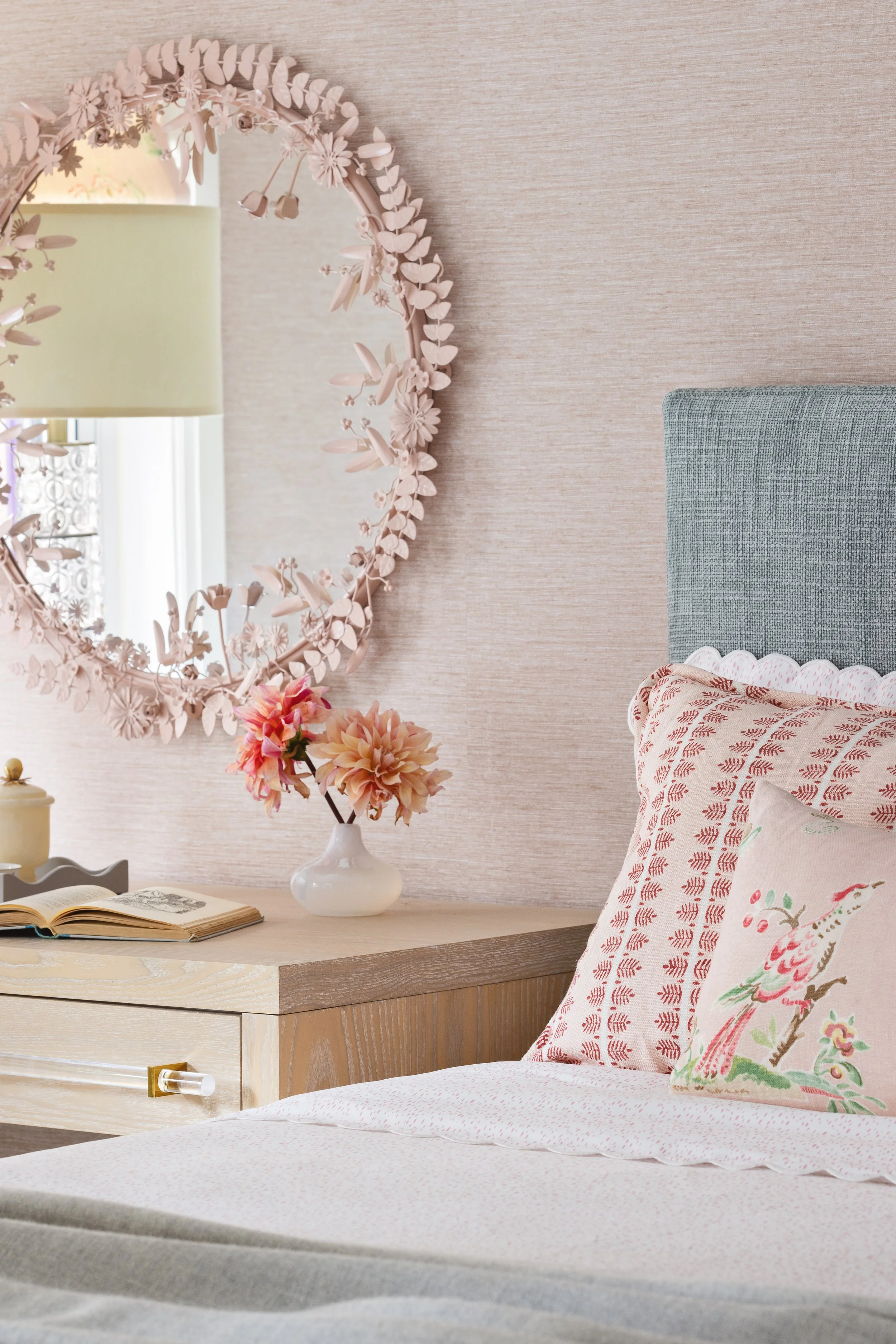 bedroom with soft pastel walls comfortable bed reading desk with mirror 