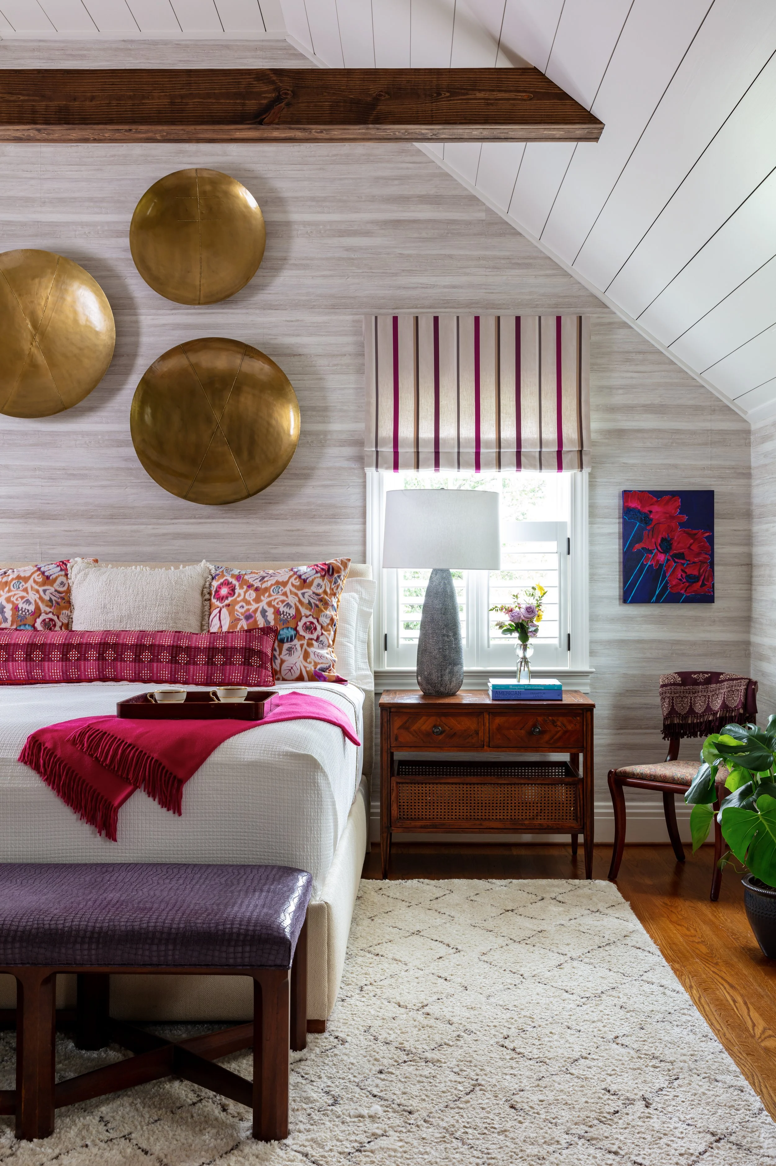 bedroom design with white shiplap walls, brass circular decor, pink striped valance, and rich wood accents for stylish home inspiration