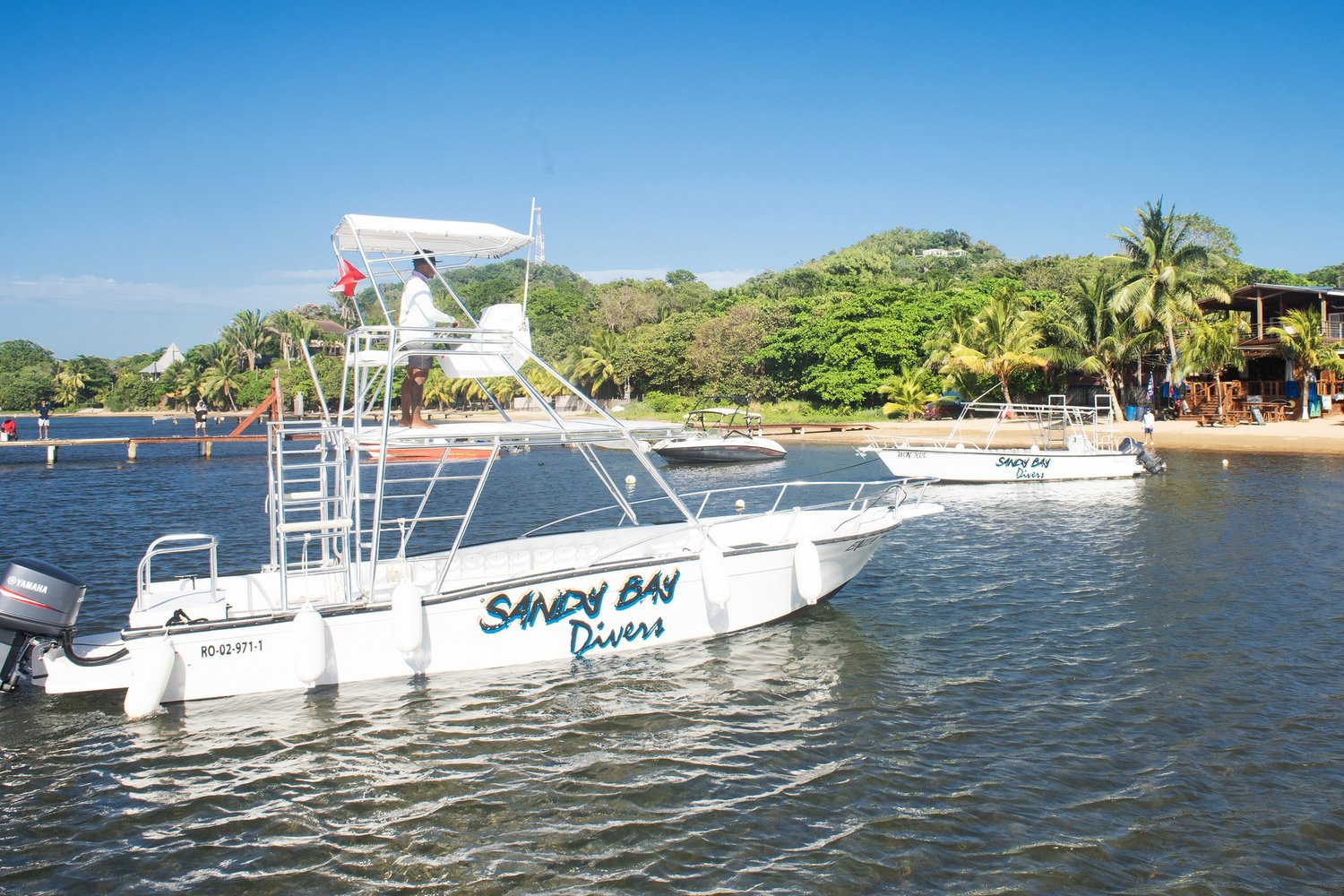 The Sandy Bay Divers boats, Ensa and Won Xul, at the dock in Sandy Bay, Roatán