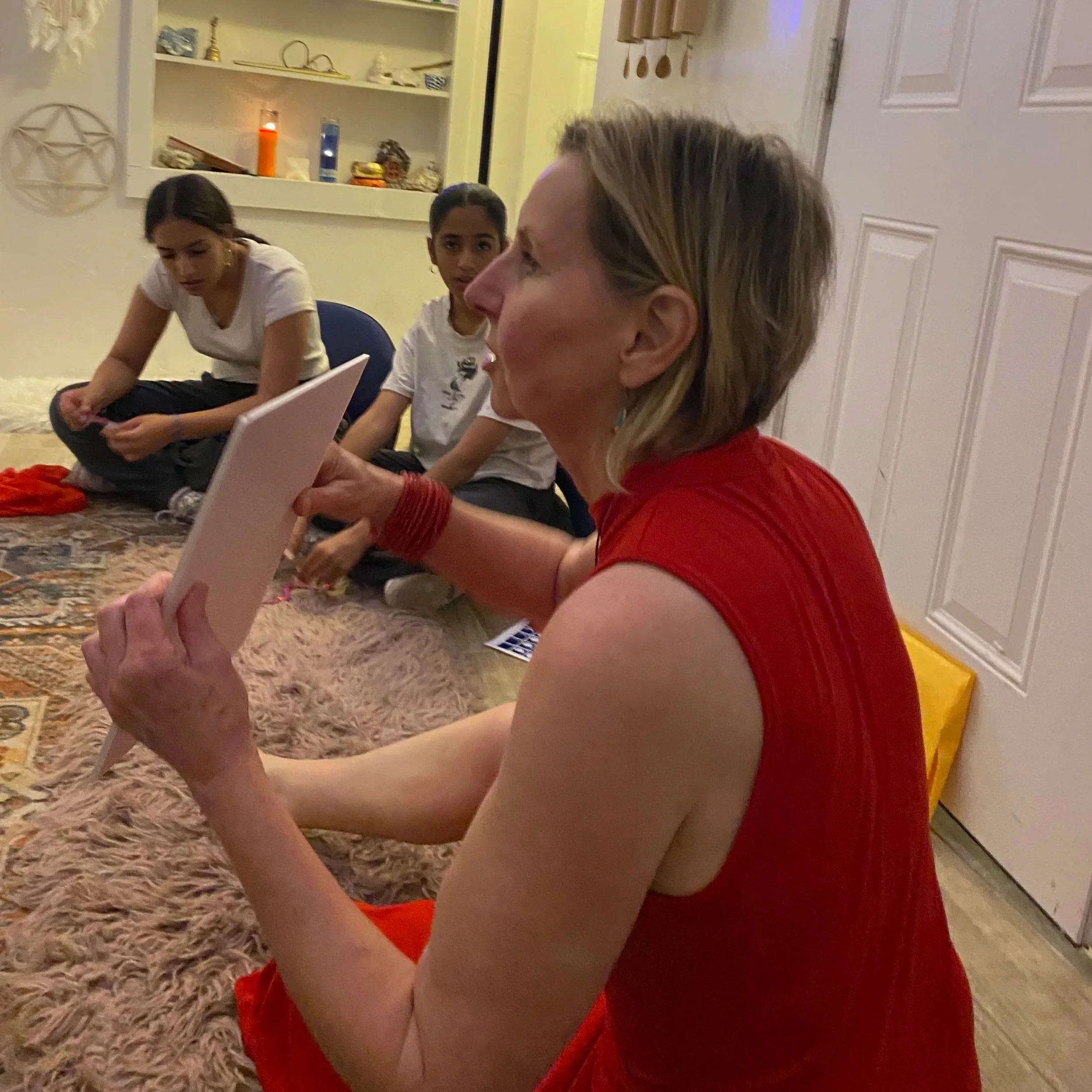 Meloney teaching Red Diamond Sisters Moon Time Magic Workshop