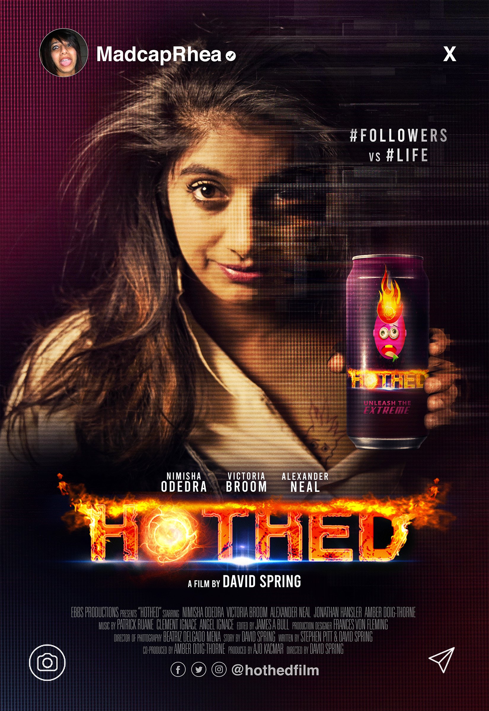 Movie poster for 'Hotwired' featuring a young woman with styled hair holding a soda can with a fiery face and the tagline 'Unleash the Extreme,' directed by David Spring, with cast members Nimisha Odehra, Victoria Broom, and Alexander Neal.