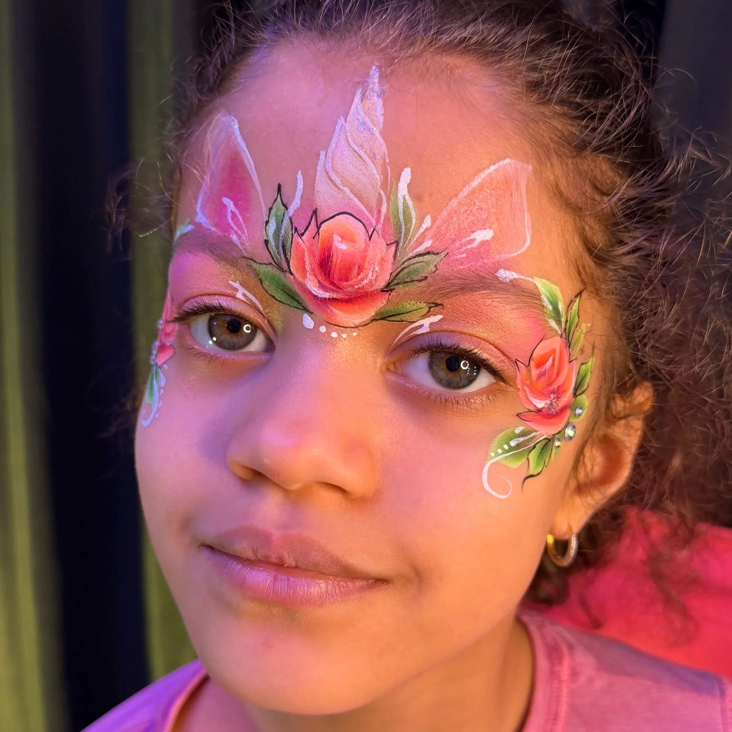 Artistic floral face painting for kids birthday parties in NYC by Holiday Event Agency