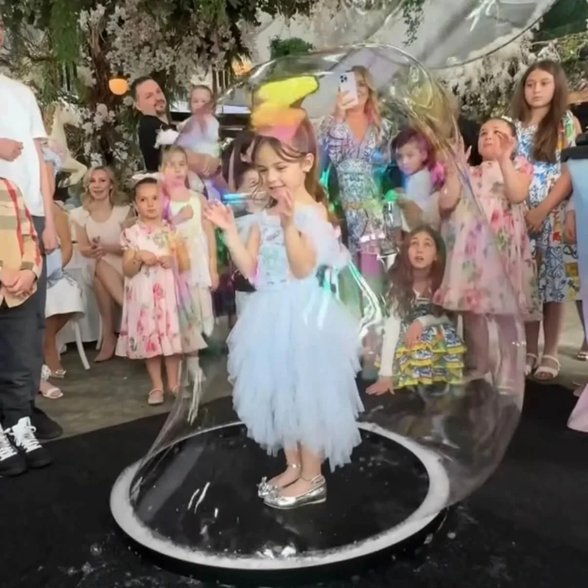 Professional Bubble Show performance in NYC featuring a child inside a Giant Bubble at the Birthday party