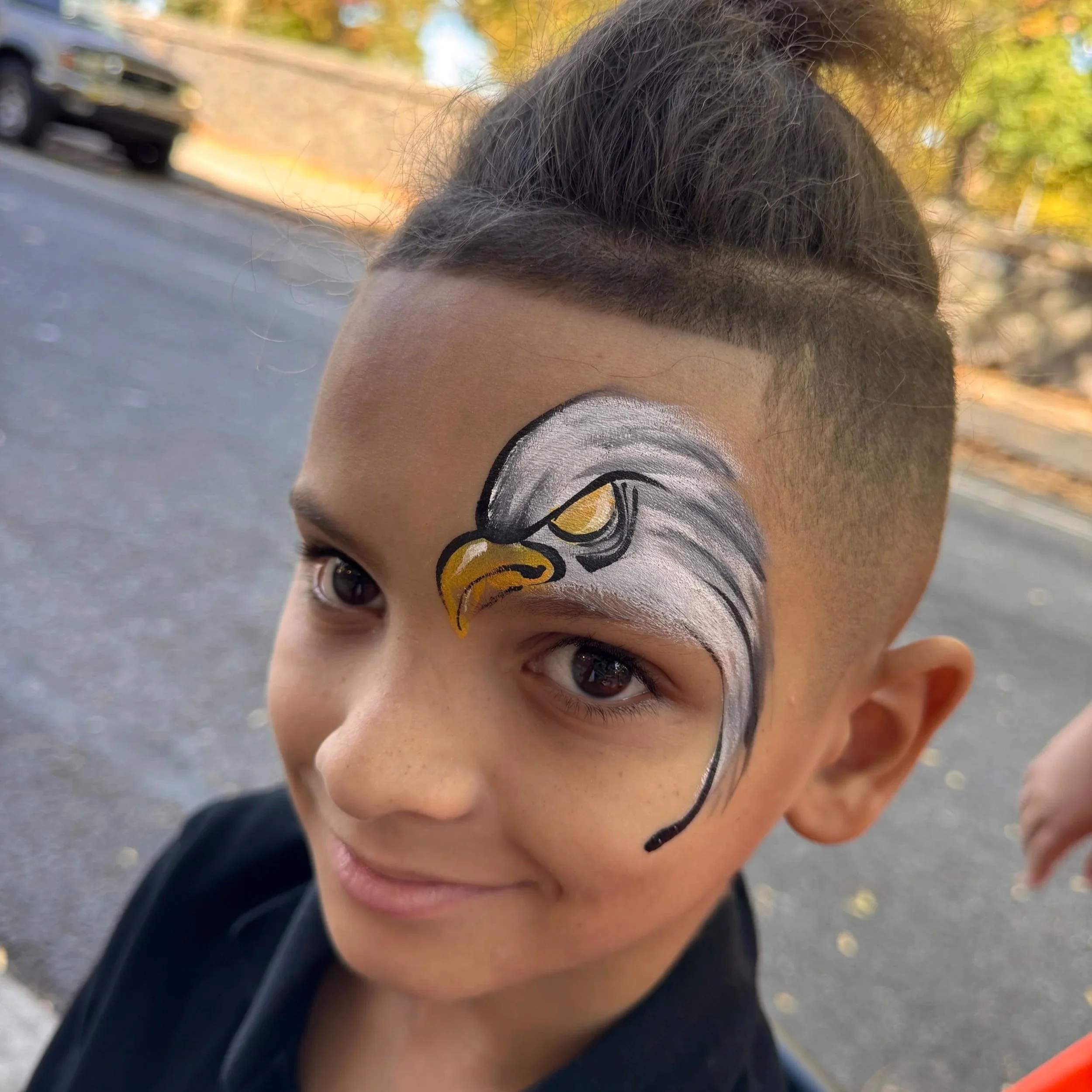 highly detailed eagle face paint for children- professional party artist ib Manhattan and Brooklyn