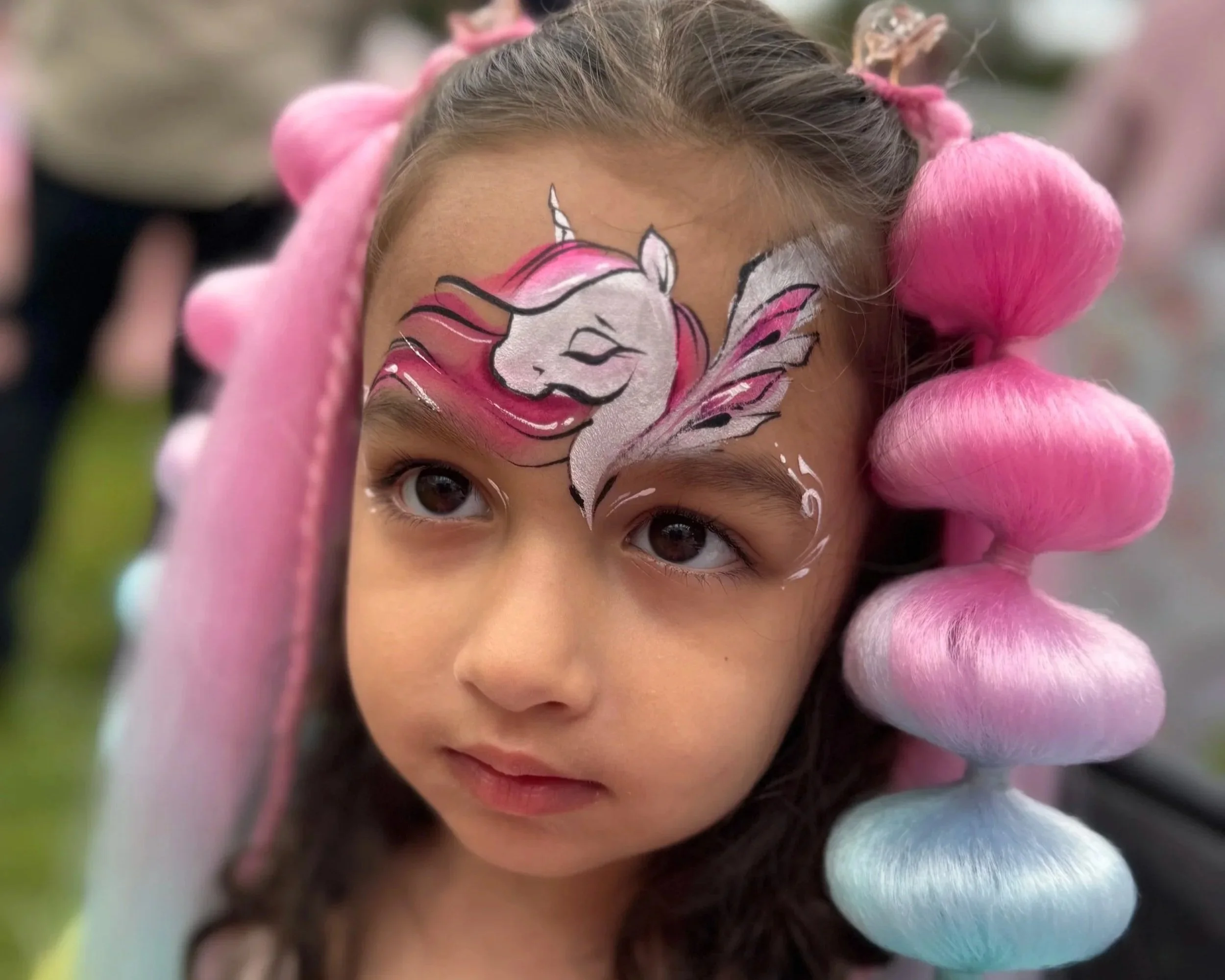 Professional face painting and hair extention add-on services for kids parties