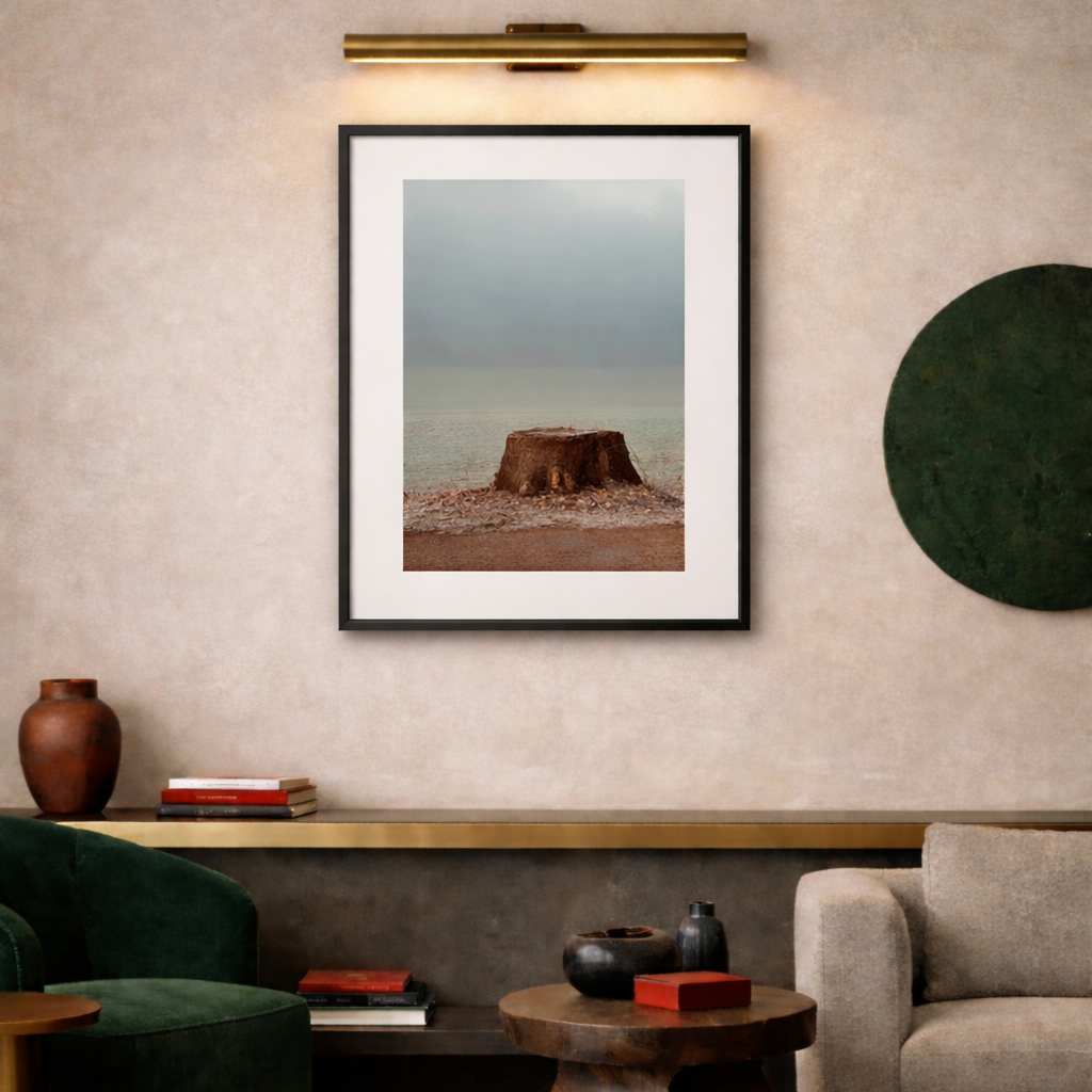 Stumped by Dakota, atmospheric landscape photograph capturing a single tree stump set within a mist-covered field, curated by Landson Studio