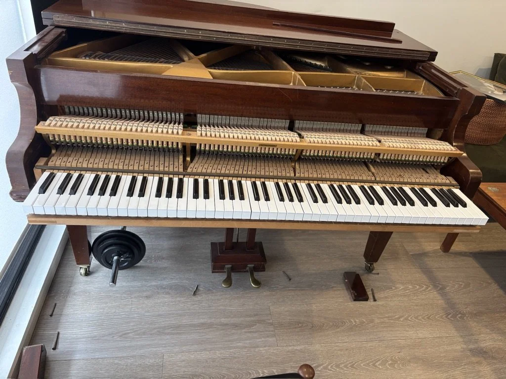 piano technician penrith in sydney repairing grand piano