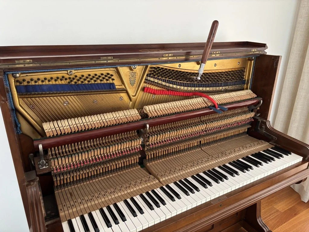 piano tuner near me in Denham Court tuning upright piano in sydney