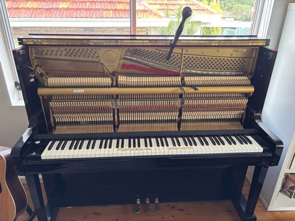 Piano tuner near Dundas tuning Kawai upright piano