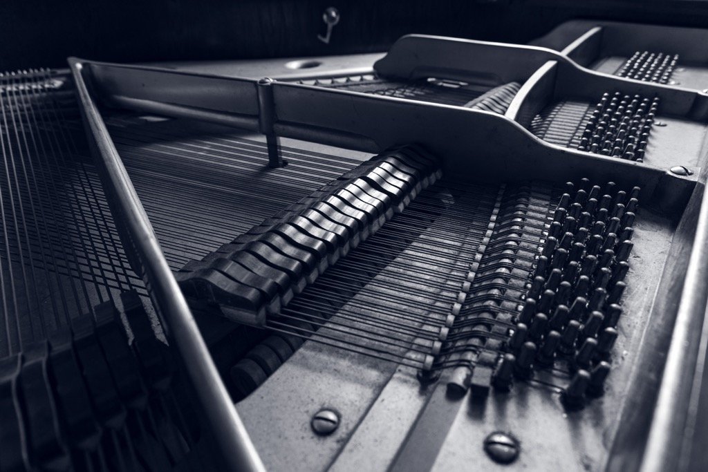 piano tuner tuning grand piano in sydney