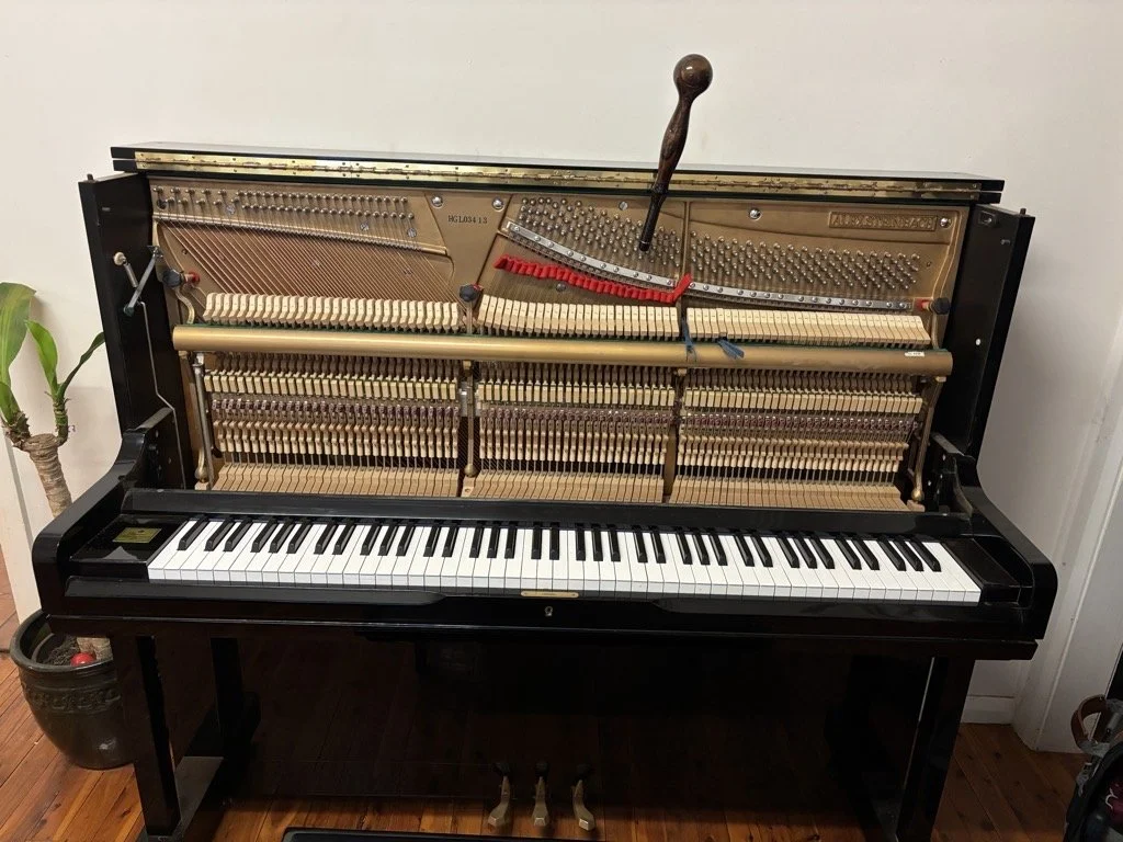 Piano tuner near elderslie tuning upright piano