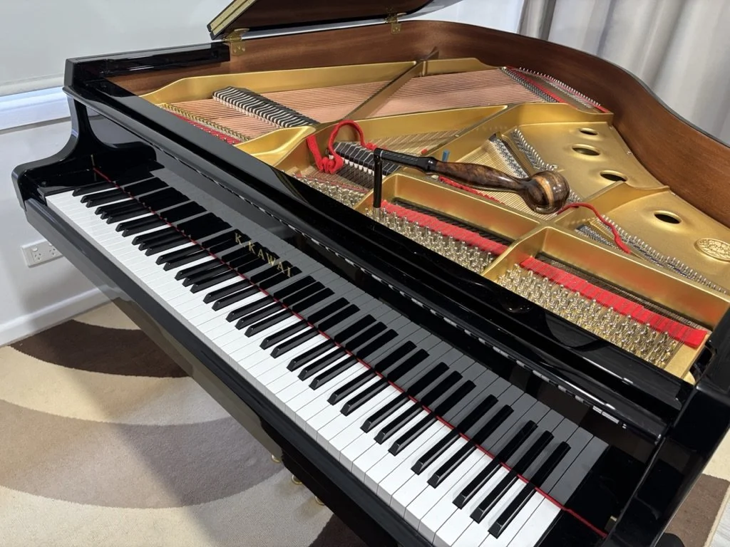 piano tuner carlingford near sydney tuning grand piano.jpeg