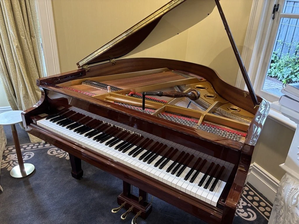 Piano tuner near Eastwood tuning grand piano