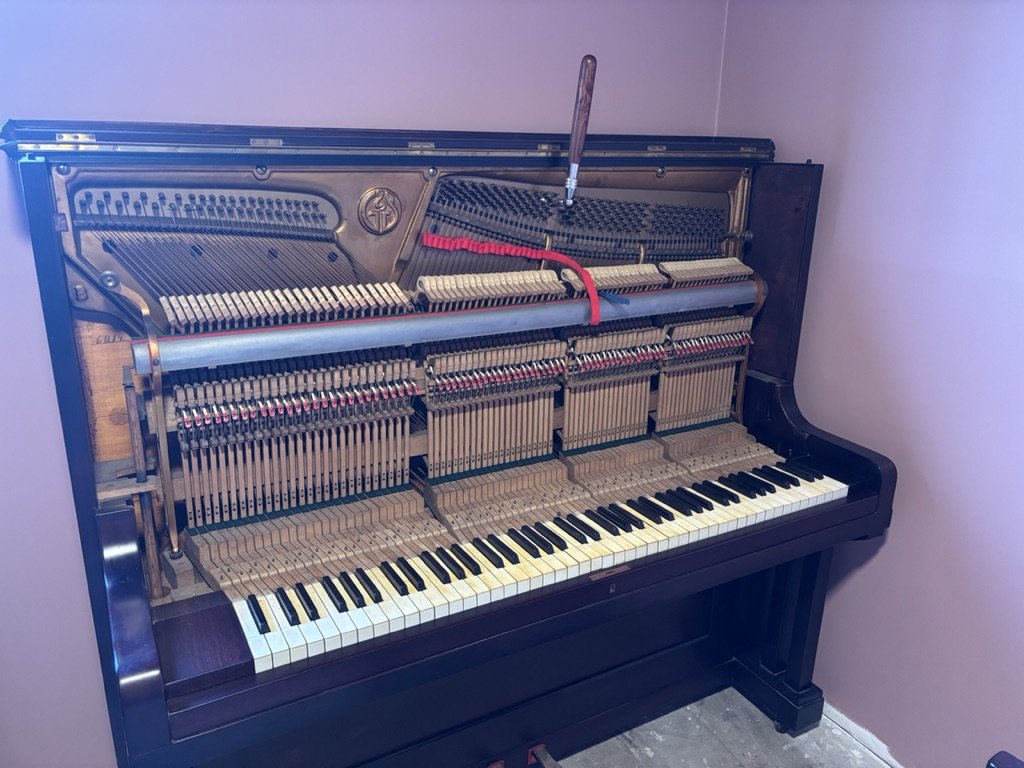 piano tuner near picton in sydney tuning old upright piano