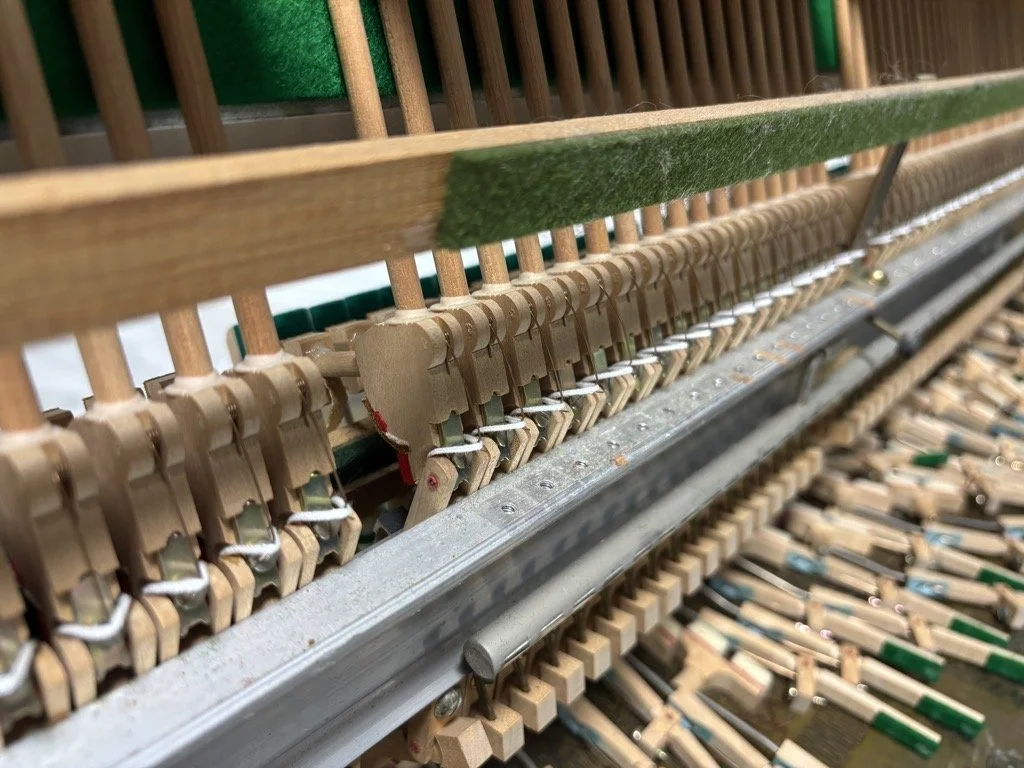 Piano tuner near me in Baulkham Hills reparing upright piano hammers