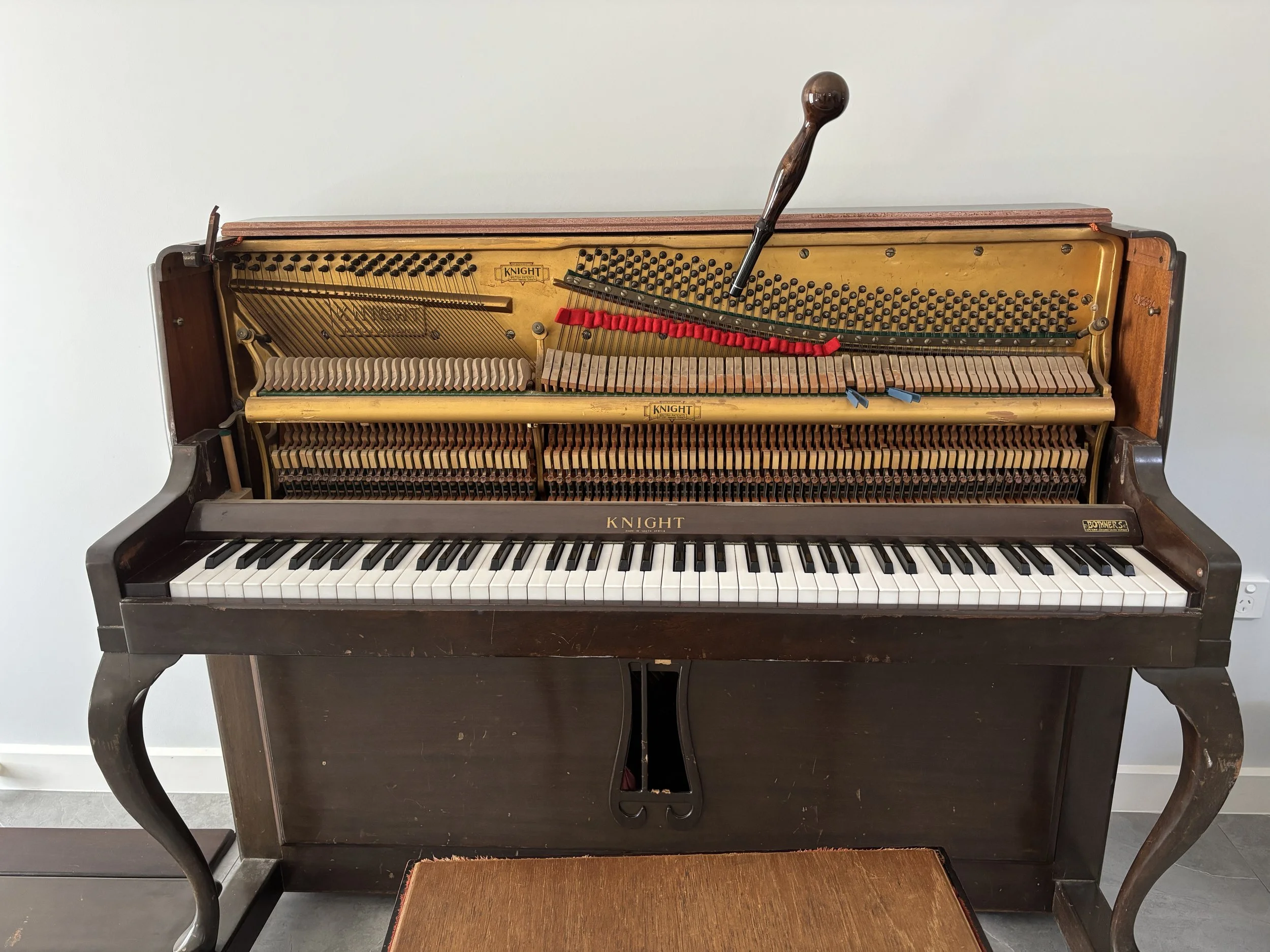 piano tuner gregory hills in sydney tuning upright piano