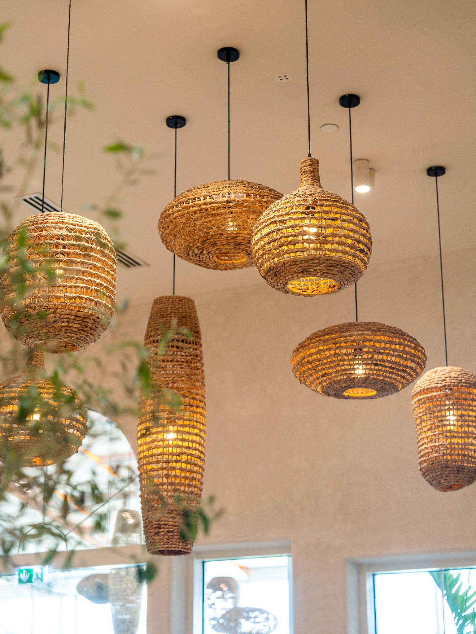 Woven pendant lighting detail at Villa Naas in Dubai, photographed by Anuraag Nair