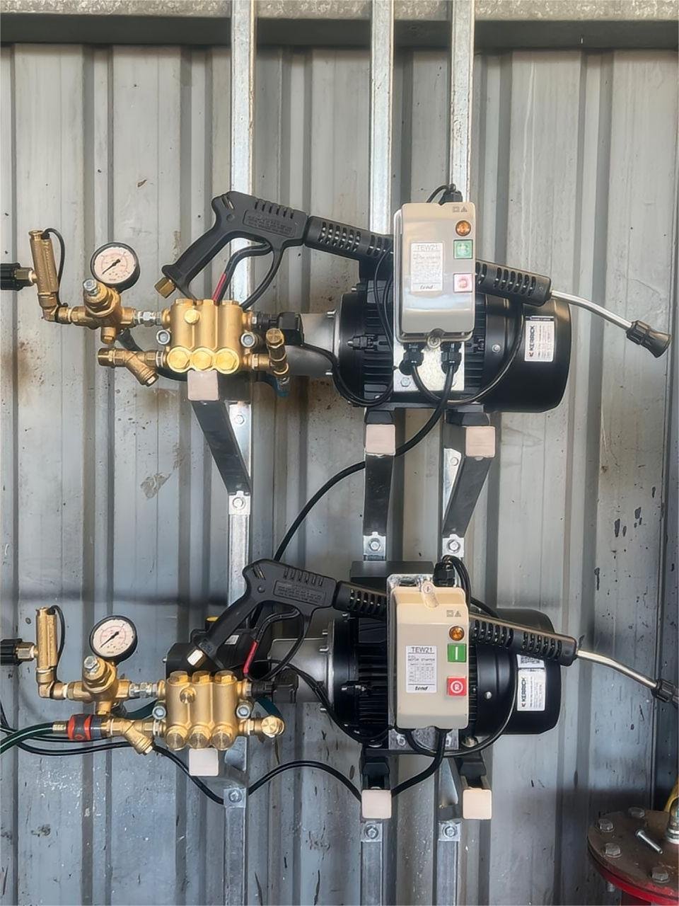 Commercial pressure washer system installation by TWSA in NSW automotive service facility.