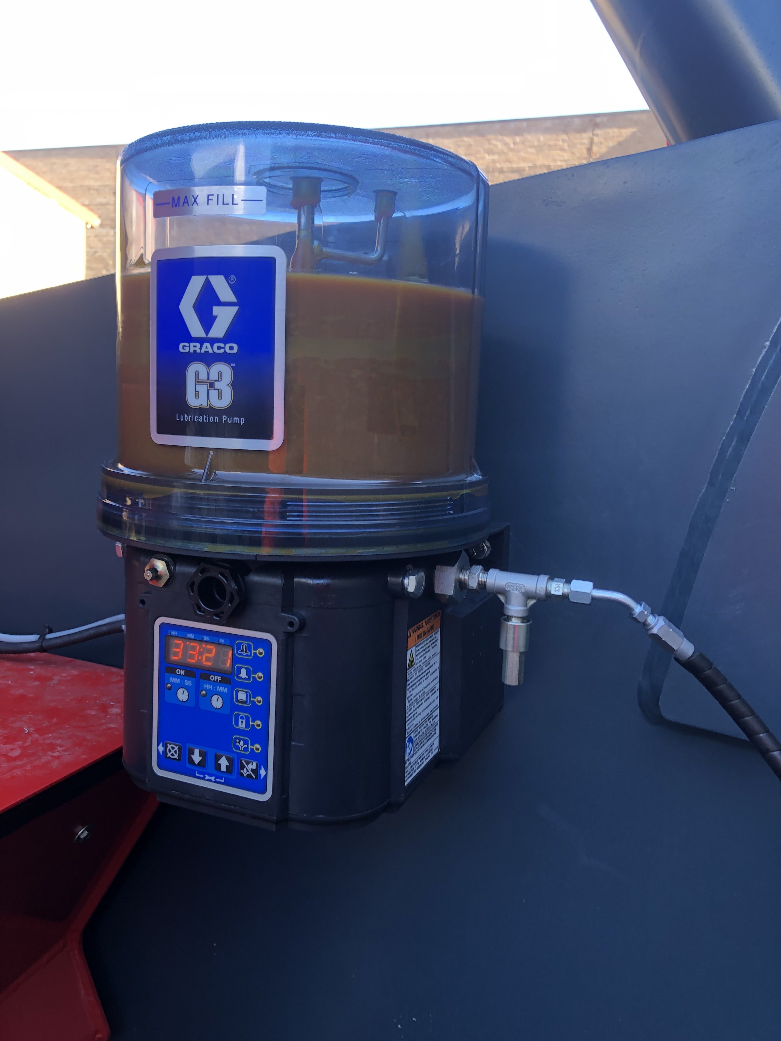 Graco G3 automatic grease lubrication pump installed by TWSA on heavy machinery in NSW for efficient maintenance and equipment protection