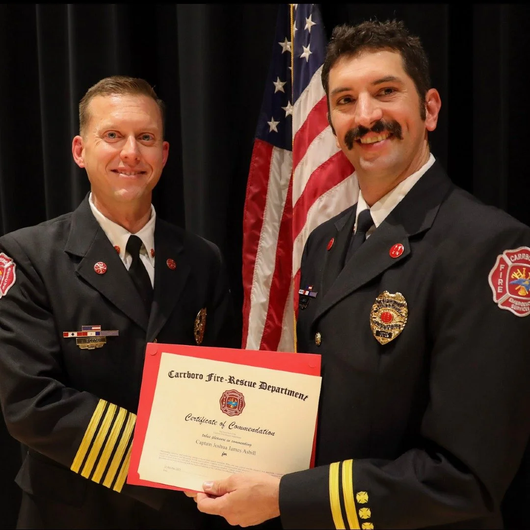 Members of the Carrboro Fire-Rescue Department, including SORS' own Asst. Chief  Josh Asbill (pictured here with Chief Will Potter, left), were honored last month for their service and dedication to the community. Recognitions included recent promoti