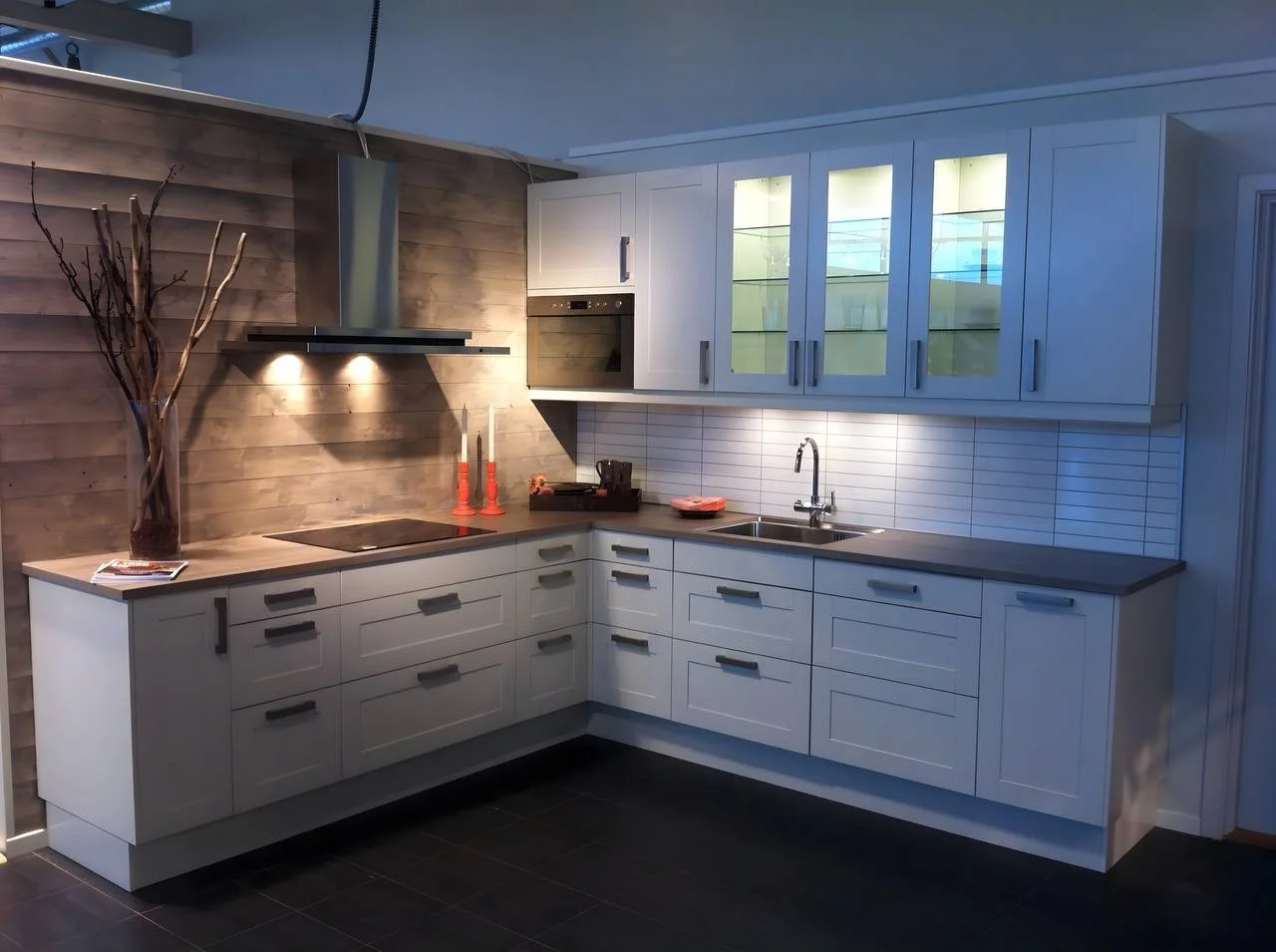 Kitchen with white interior and and warm lights