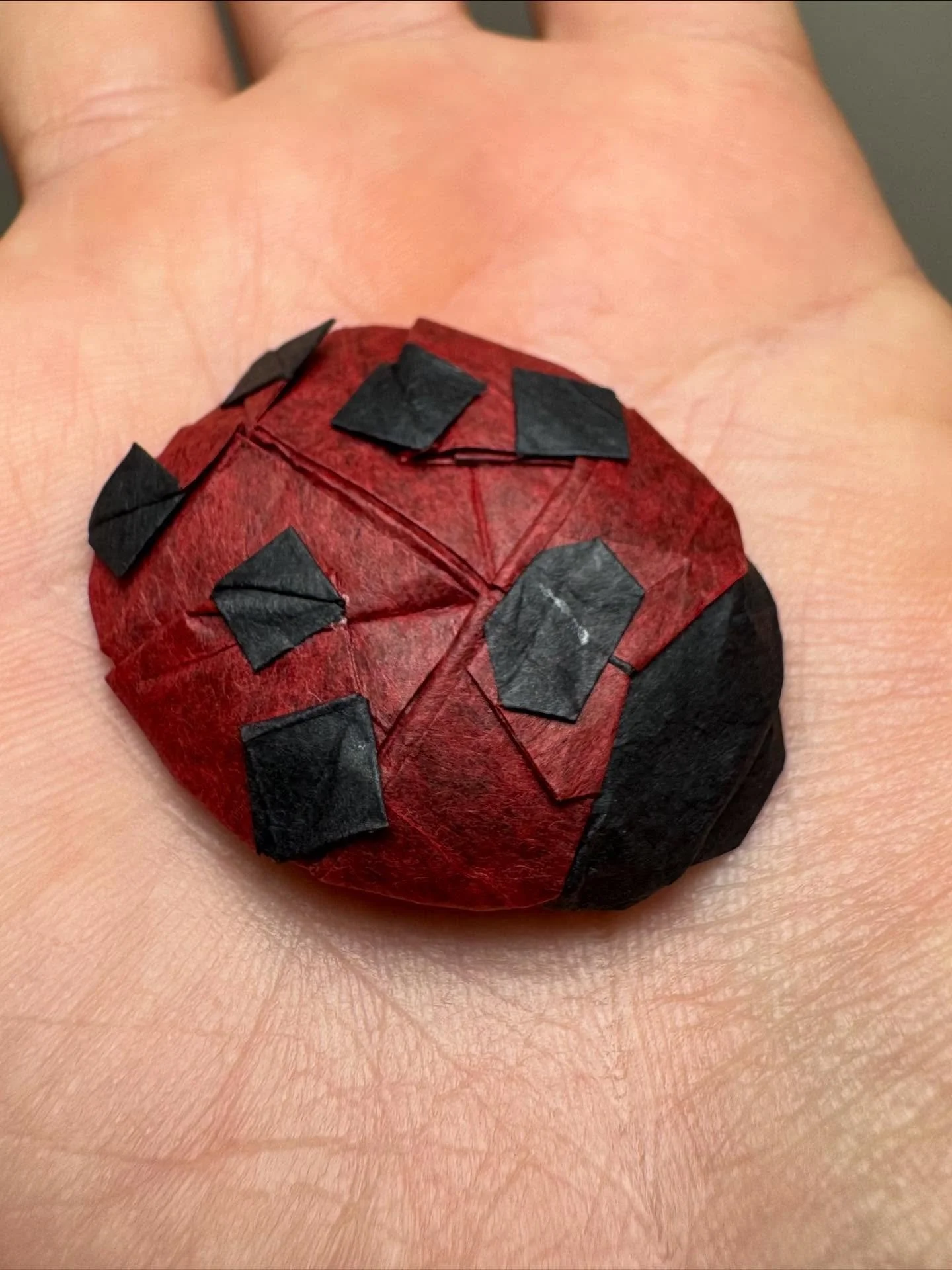 Ladybug, designed by Inayoshi Hidehisa.
Folded with an 11.5cm square of Red/Black double tissue from diagrams in Origami Insects Premium. Both from Paper Tree (@papertreesf ).
