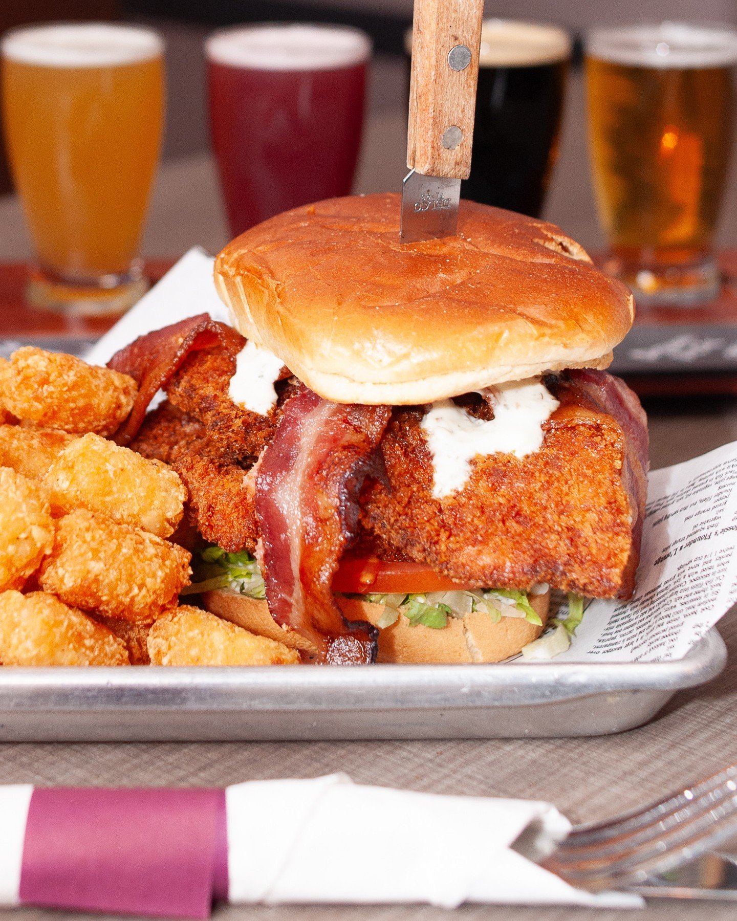 If you listen close enough, you'll hear our Chicken Bacon Ranch calling out to you...⁠
⁠
Katsu chicken breast, bacon, lettuce, tomato, and Bacon Ranch on a toasted bun! 🥓😋
