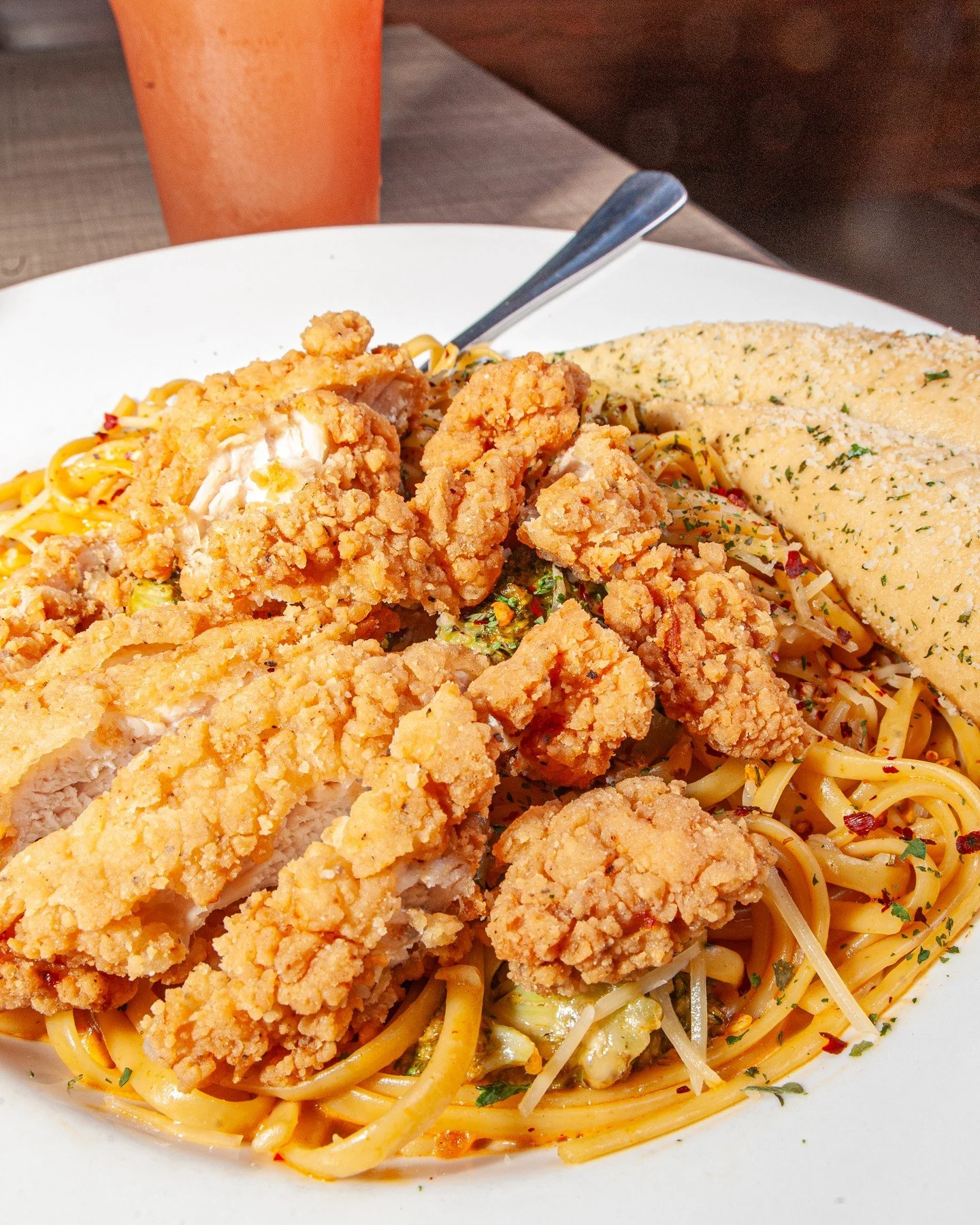 There&rsquo;s a reason everyone&rsquo;s obsessed with Fire Pasta 🔥⁠
⁠
Linguini and diced chicken breast tossed in our famous spicy Fire Sauce, finished with parmesan and chili flakes.⁠
⁠
⚡️Want to go bigger? AMP it up with crispy fried chicken and b