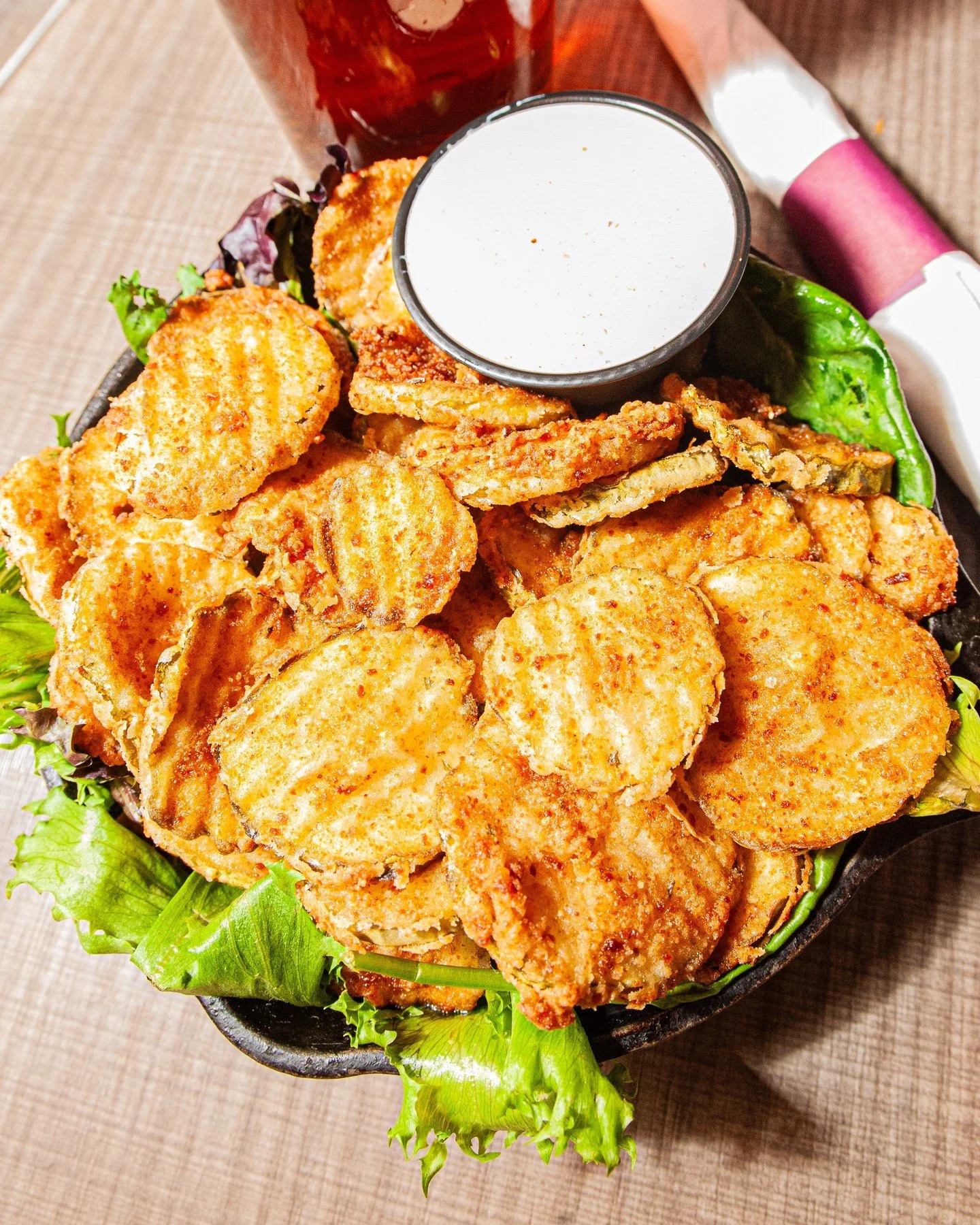 Happy hour is served daily from 3pm-6pm! ⁠
⁠
Our crispy fried-to-order pickle chips with Cajun ranch are just $6 and grab a pint of our craft brew for $5. ⁠
⁠
That's just a taste of our food and drink specials that await!