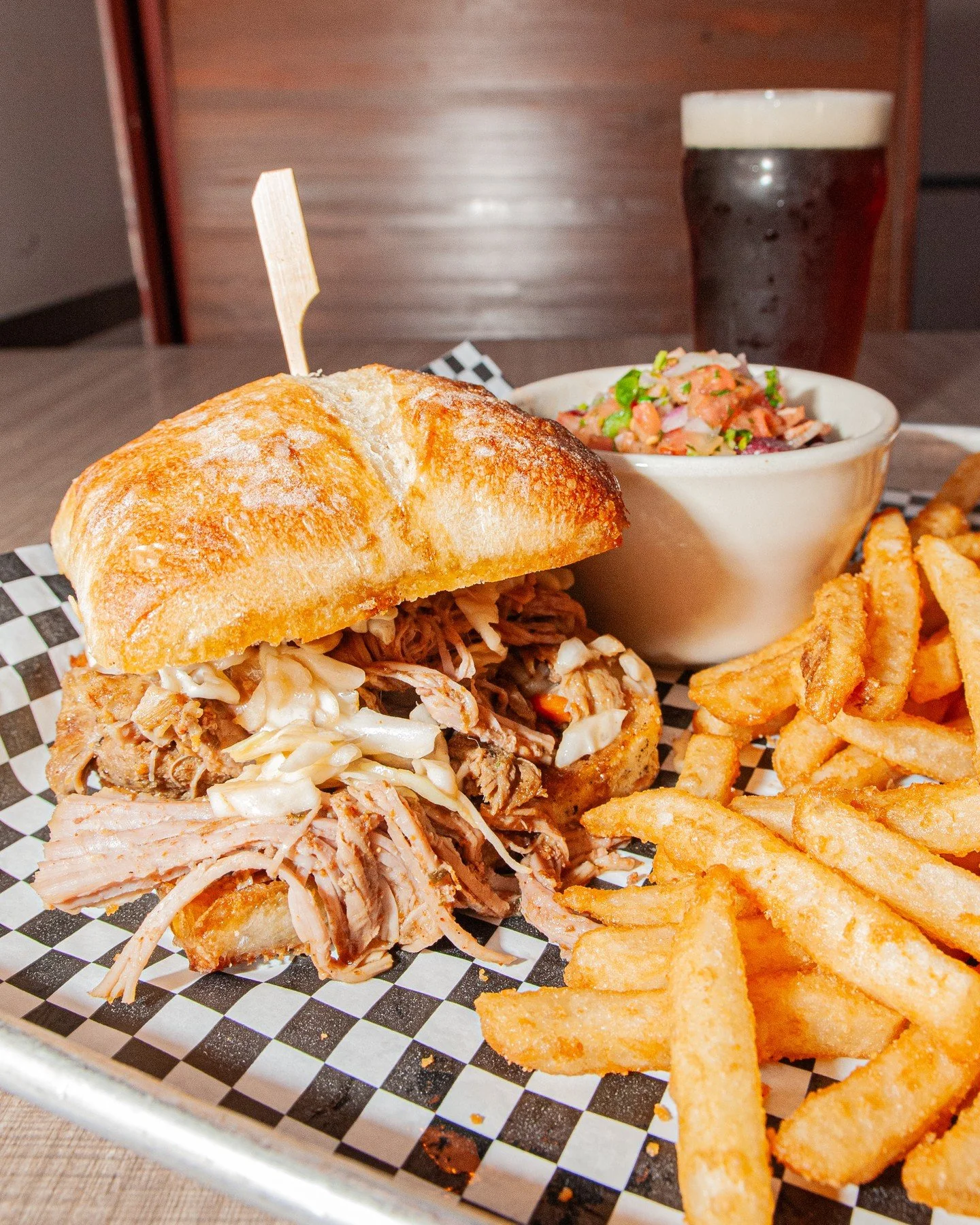 Come catch the Seahawks game on Sunday and grab our Tailgate Special! 🏈💚💙⁠
⁠
Powerhouse Lager Braised Pulled Pork Sandwich &mdash; loaded with house-made dry Irish Stout BBQ sauce, maple balsamic slaw, and served on a ciabatta roll with fries and 