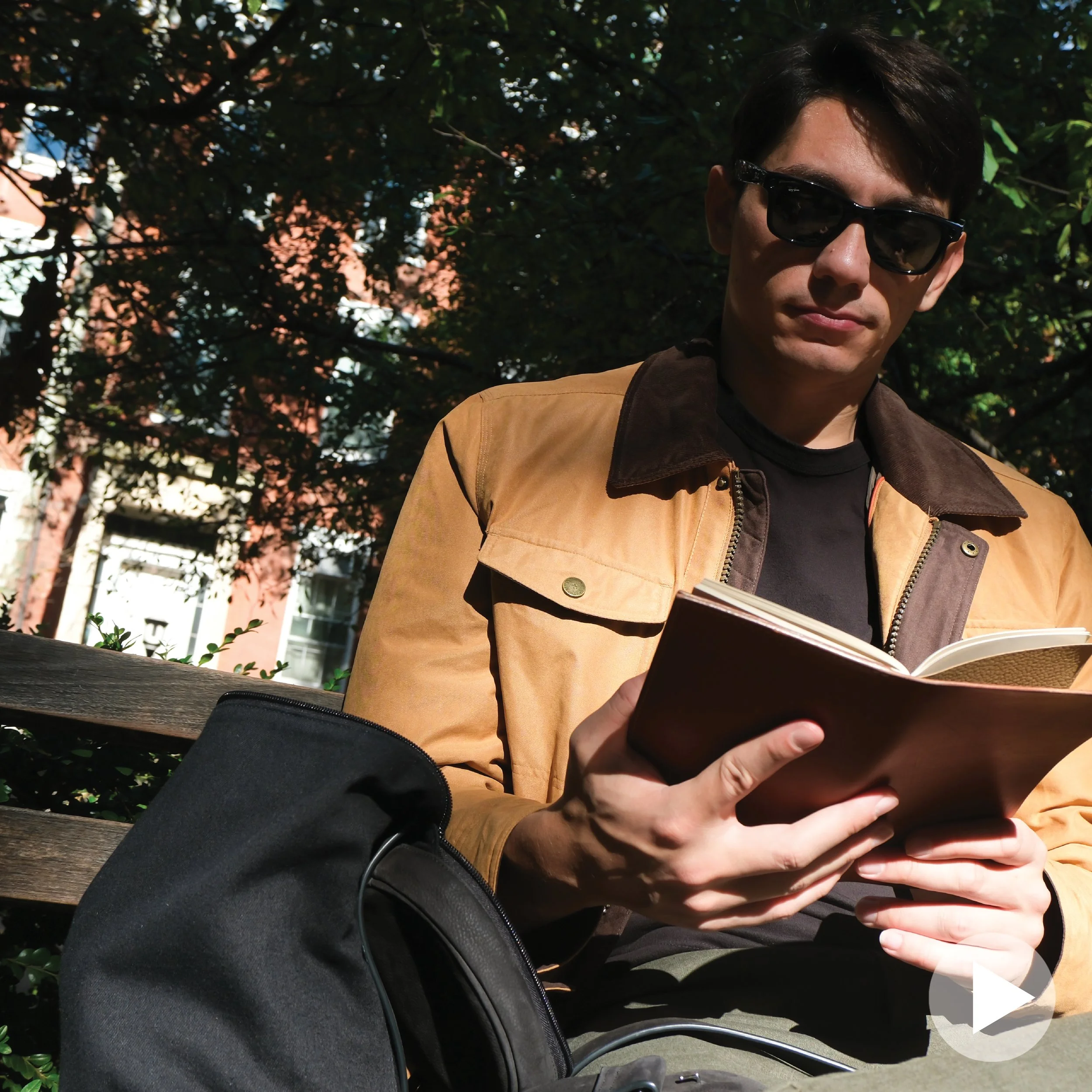 Sam sluggin' reading his Book