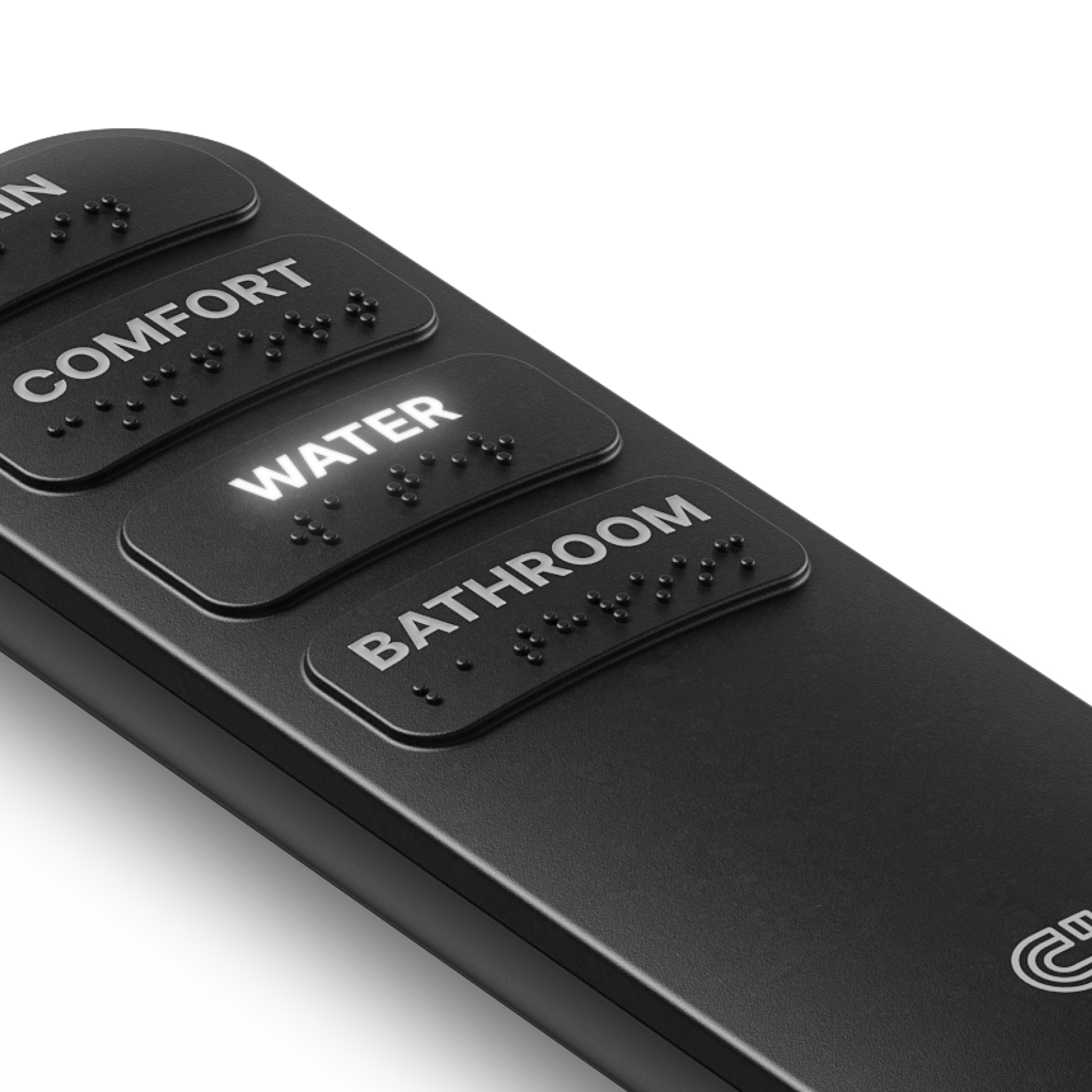 Close-up of a black remote control with Braille labels for various buttons including 'WATER', 'COMFORT', 'BATHROOM', and 'ROOM'.