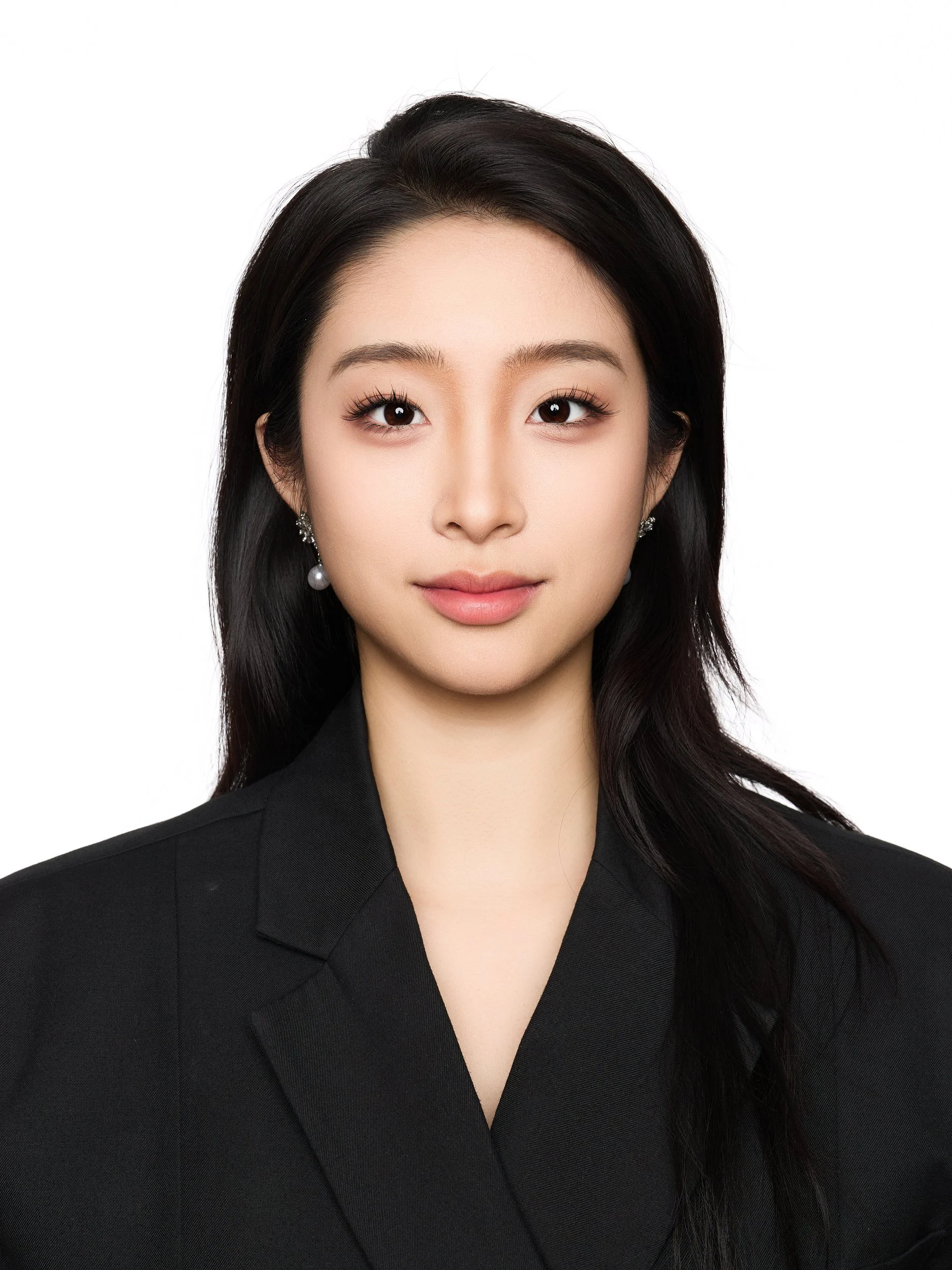 Front-facing ID-style headshot of a woman with long hair in a black jacket