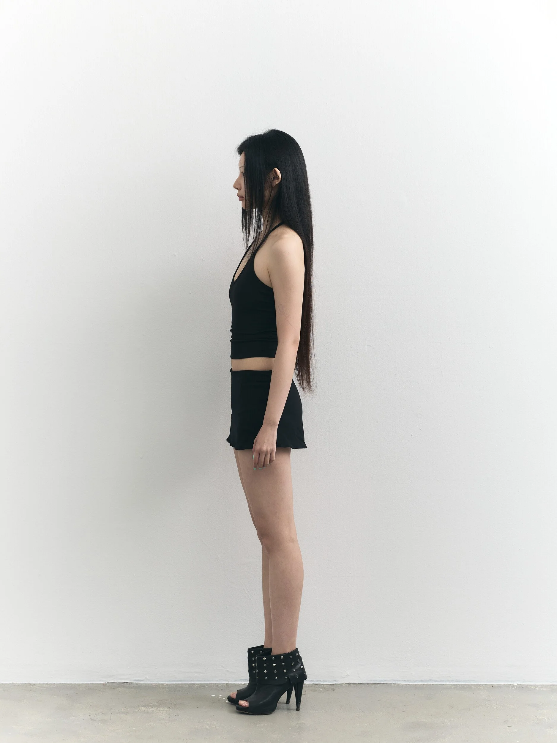 Model digitals: full-length side profile of the model