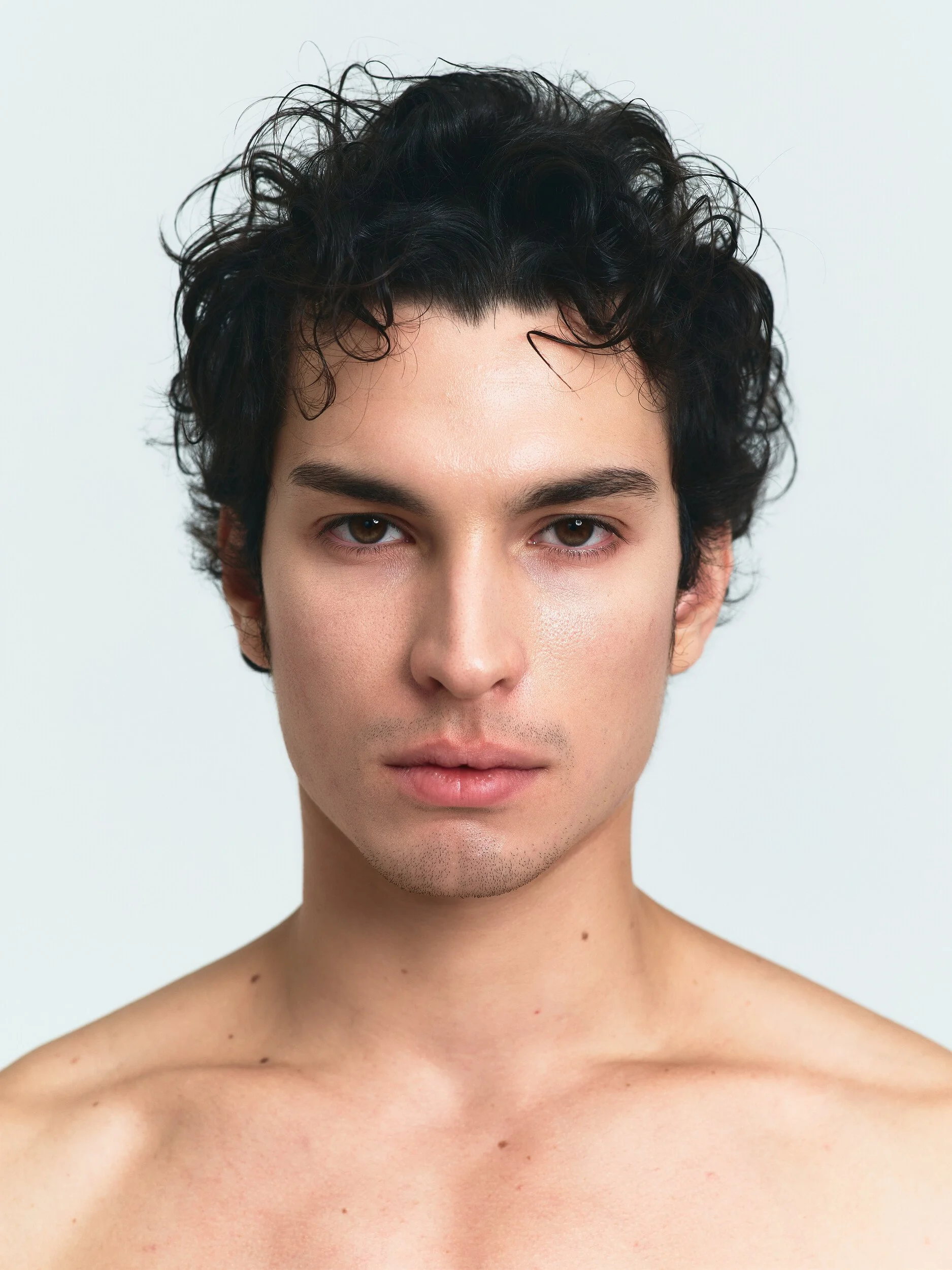 Model digitals: bare-shoulder close-up of the same model