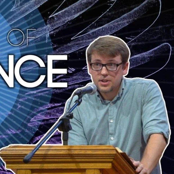 Pastor Jacob Mannear preaching to the congregation.