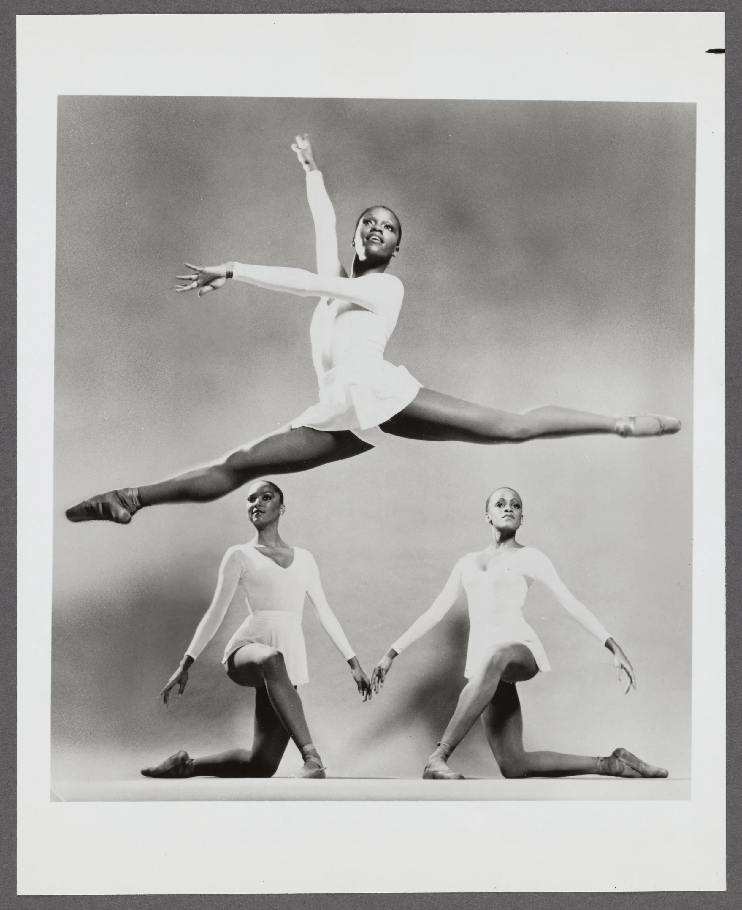 Cassandra Phifer (in motion), Melanie Person, and Charmaine Hunter of Dance Theater of Harlem, performing “Concerto Barocco.”

By Martha Swope, courtesy of the Schomburg Center for Research in Black Culture
Dance Photograph Collection
Photographs and