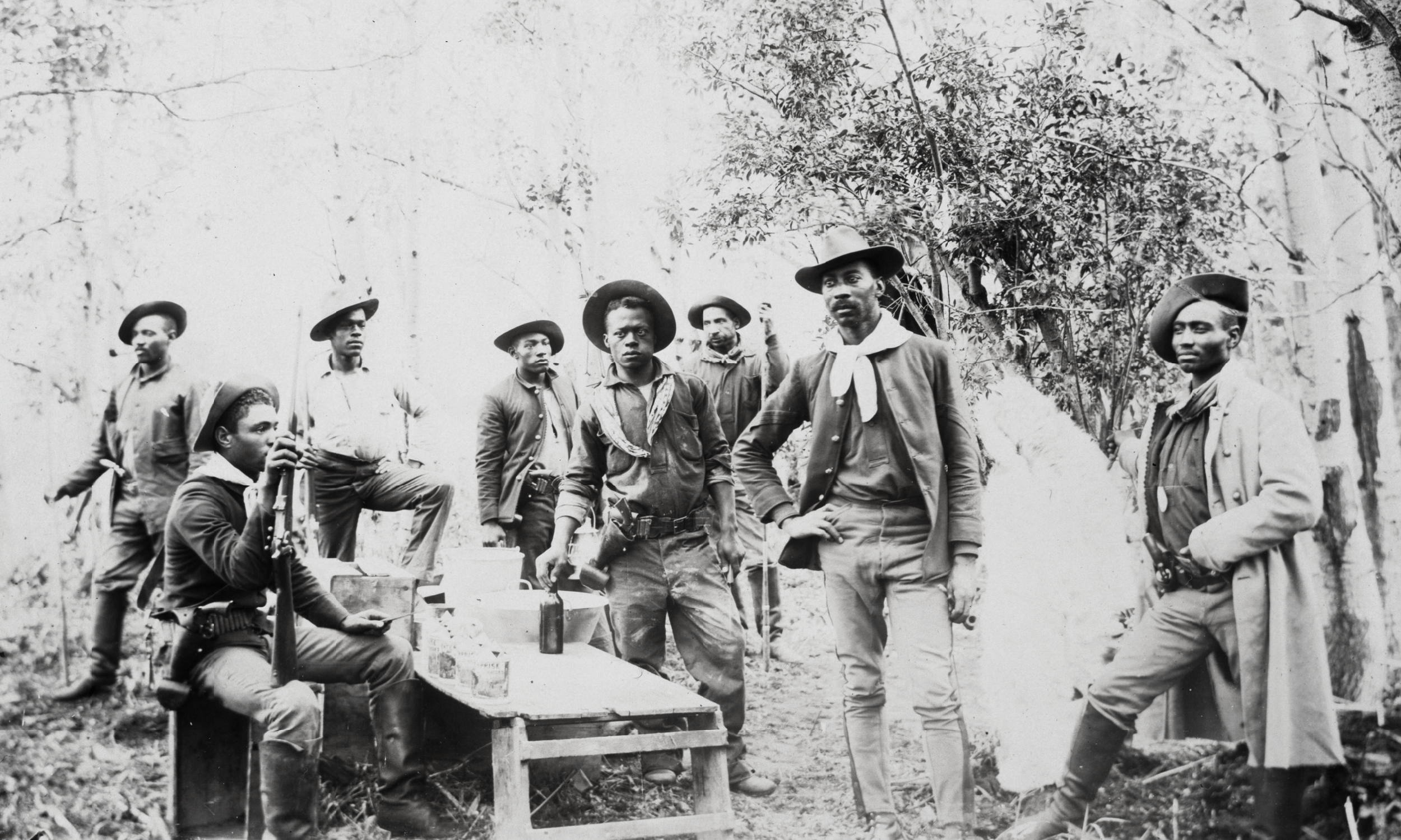 ★ August 1894, View of eight 10th Cavalry Regiment (Buffalo Soldiers) posed in a wooded area while escorting General Merritt’s party, St. Mary, Montana. Montana Historical Society Library and Archives [957-993].