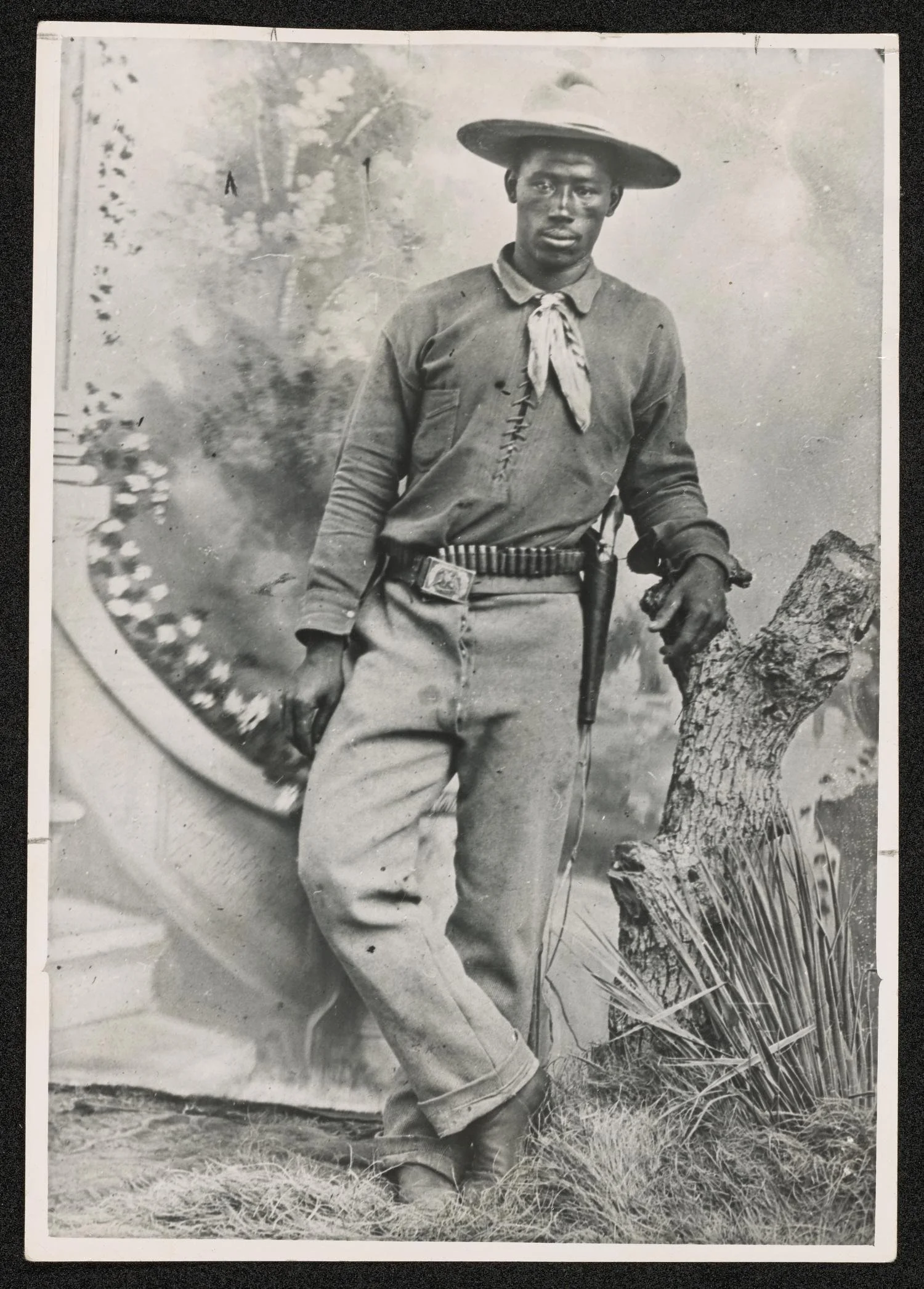 ★ c. 1870 - 1900, Decorated studio portrait of 'Coaly the Cowhand.' The inscription on the back of the photograph reads, "Coaly, the boy who could ride and rope 'anything that has four feet and wore hair'". University of North Texas Libraries, The Po