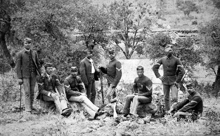 ★ c. 1890, Photograph of eight troopers of the U. S. 10th Cavalry Regiment, probably at Fort Apache, Arizona. General Photograph Collection, University of Texas at San Antonio. Image ID [075-0299]. 
