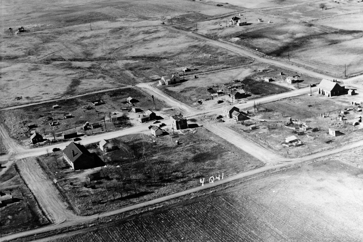 ★ NICODEMUS, KANSAS | HOMESTEAD SETTLEMENT SITE AFTER ITS HAYDAY ★ c. 1953, “Aerial view of Nicodemus from the Northeast,” 1953. Photomural from gelatin-silver print. Historic American Building Survey Field Records, Prints and Photographs Division, L