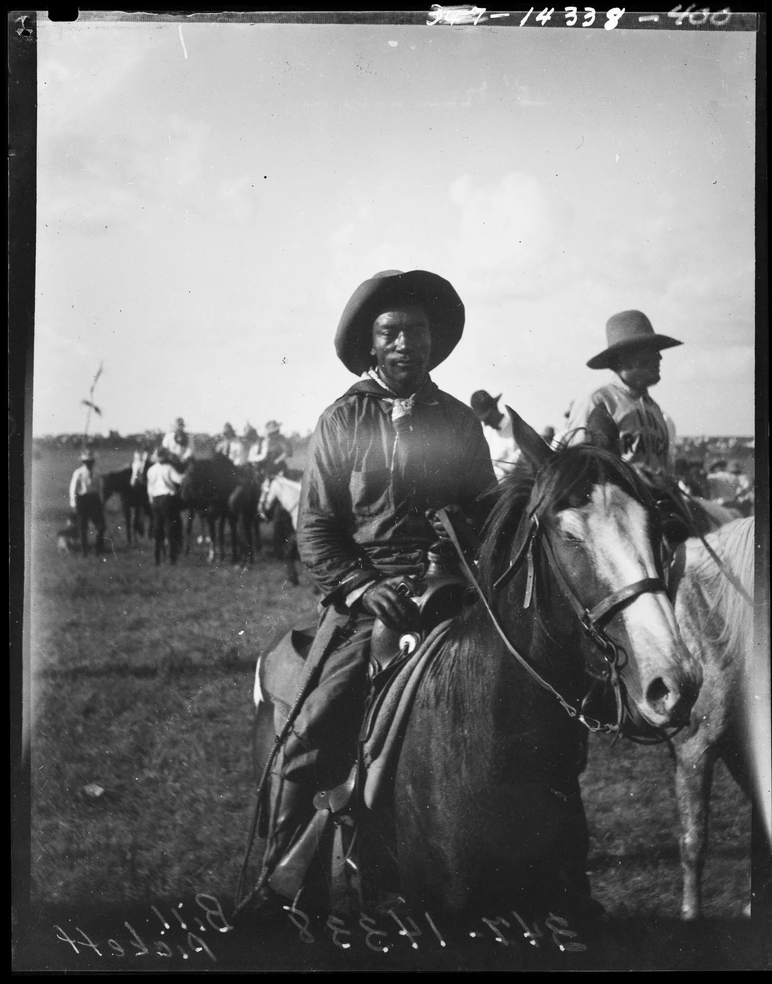 ★ c. 1910, Photograph of Bill Pickett on a horse. Bill Pickett, one of the most notable Black cowboys of the American West, famously created the technique called "Bull Dogging," which refers to the act of wrestling a steer in a rodeo setting. ★ The G