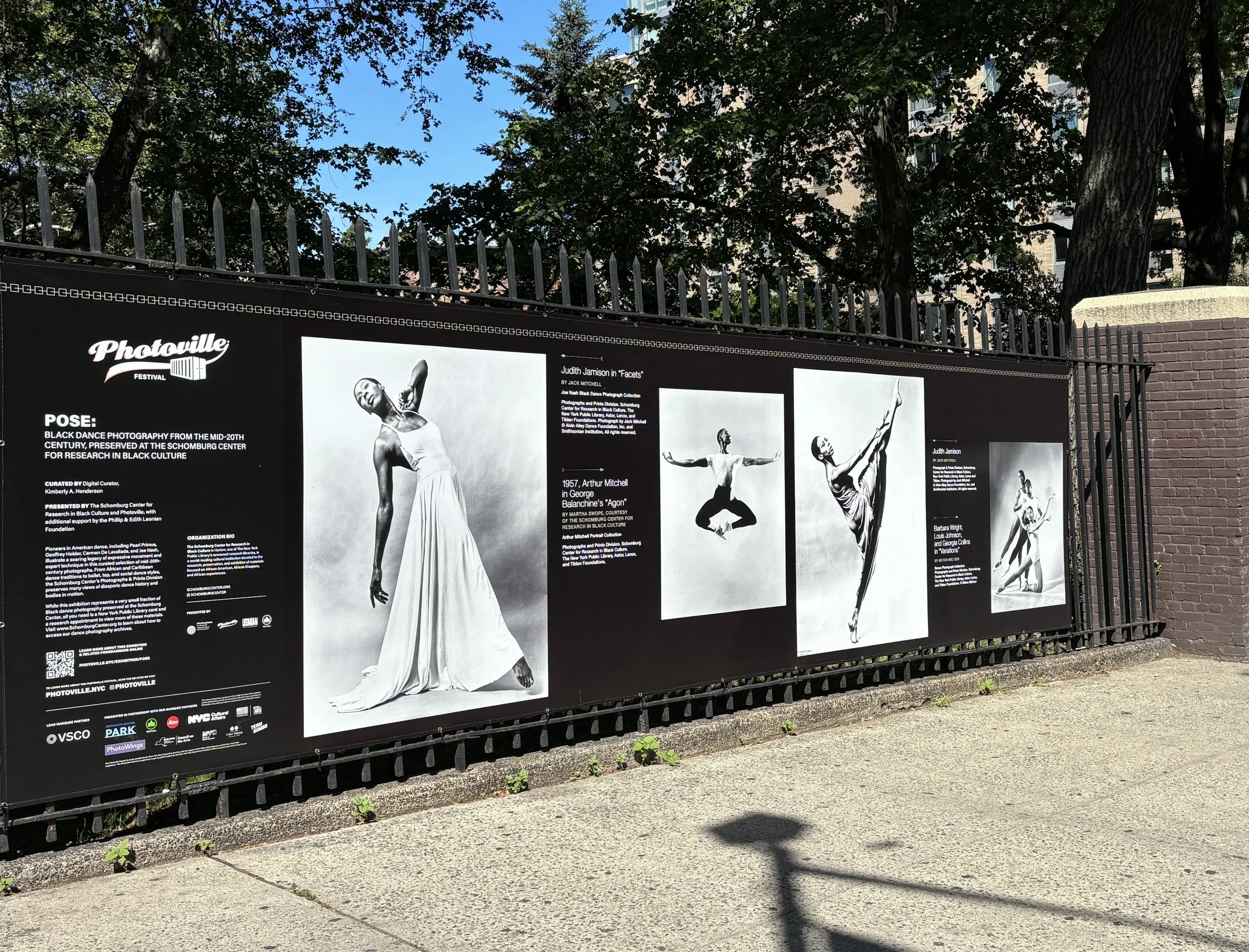 Photograph of an installation view of the Photoville Festival exhibition, POSE - Black Dance Photography from the Mid-20th Century, Preserved at the Schomburg Center for Research in Black Culture.