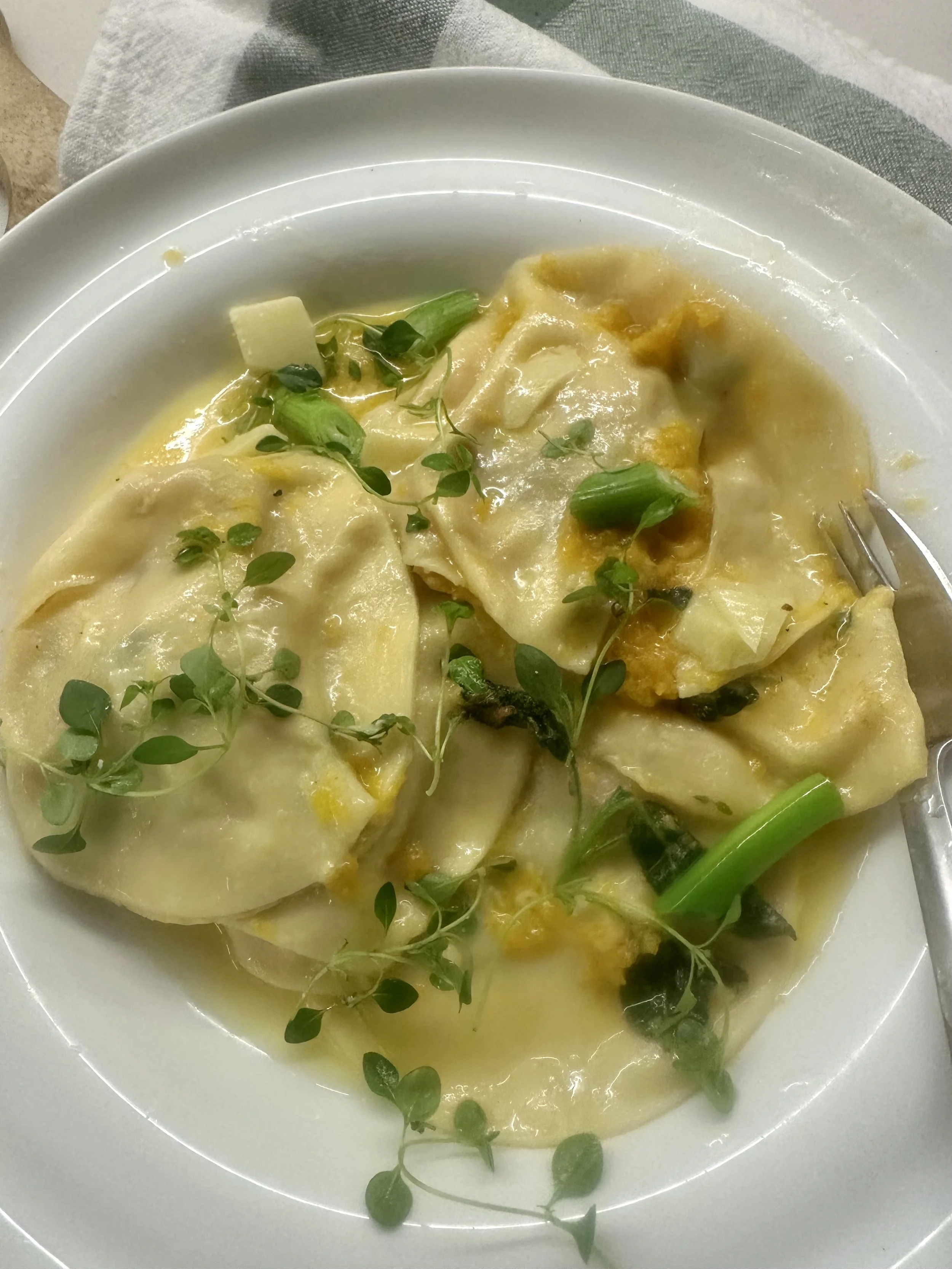 PUMPKIN AND CHEESE RAVIOLI WITH A SAGE BUTTER SAUCE