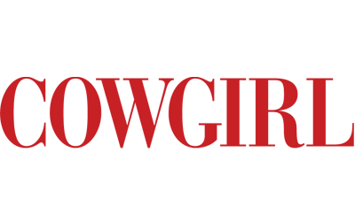 The word 'COWGIRL' in large red letters on a white background.