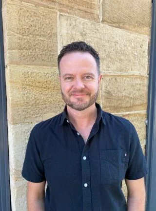 Headshot of Angus Hohenboken, Digital Storyteller