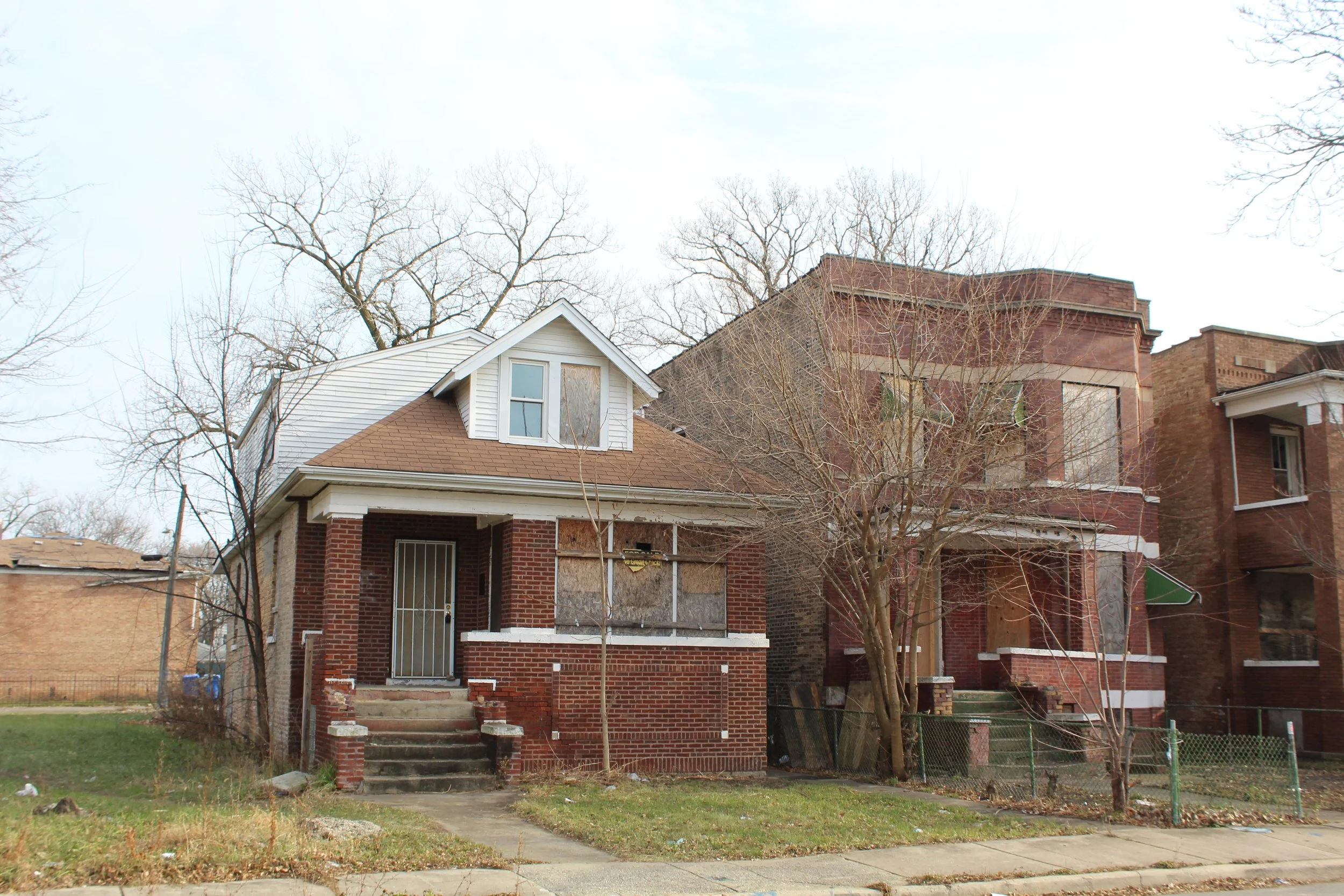 Unfinished and overgrown property illustrating common reasons why houses get abandoned in Chicago.