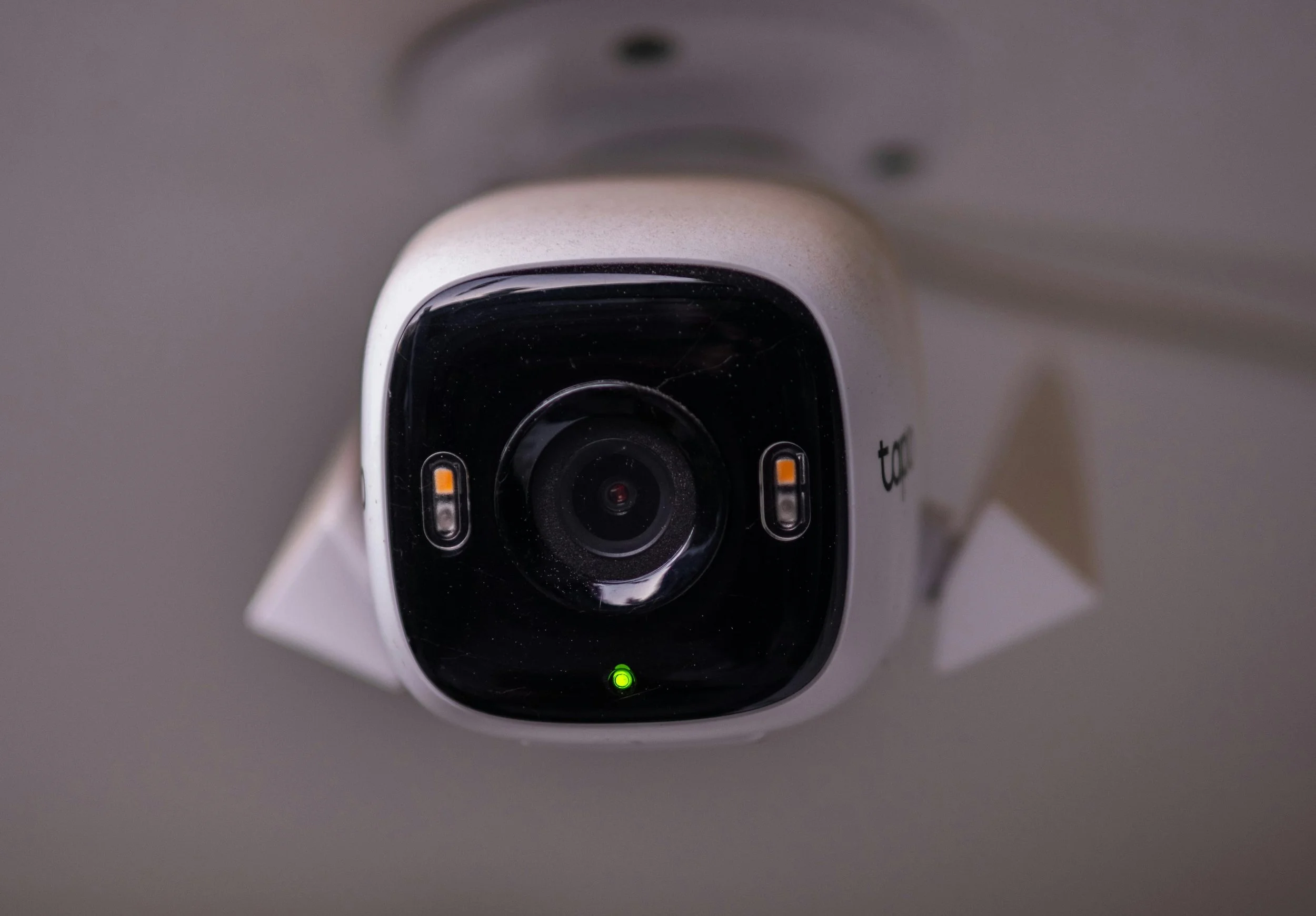 Modern security camera mounted on a property.