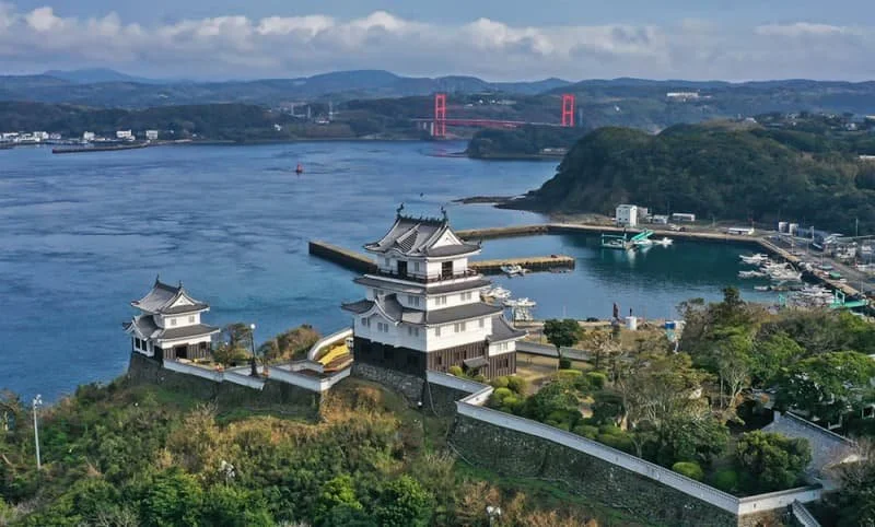 Hirado Castle overlooking the Hirado Strait in Nagasaki, a reconstructed hilltop fortress ranked among Japan's Top 100 Castles.