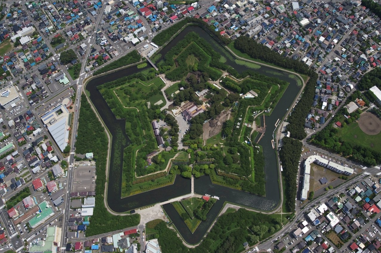 Aerial view of Goryokaku's perfect star-shaped fort and moat in Hakodate, Hokkaido — a historic gem set within the city.